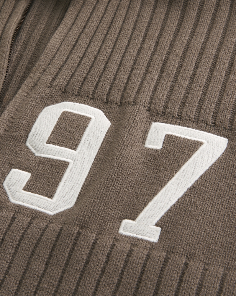 Suéter holgado con cremallera y gráfico de números