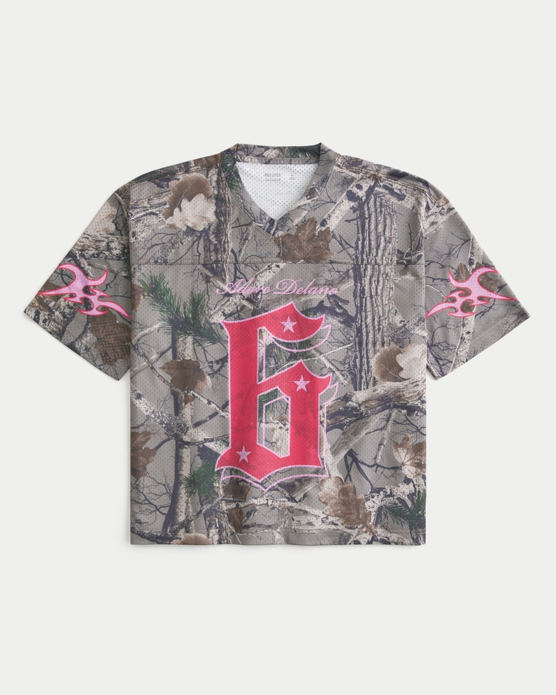 Camiseta de fútbol americano de corte cuadrado de camuflaje y corta con estampa de Adore Delano