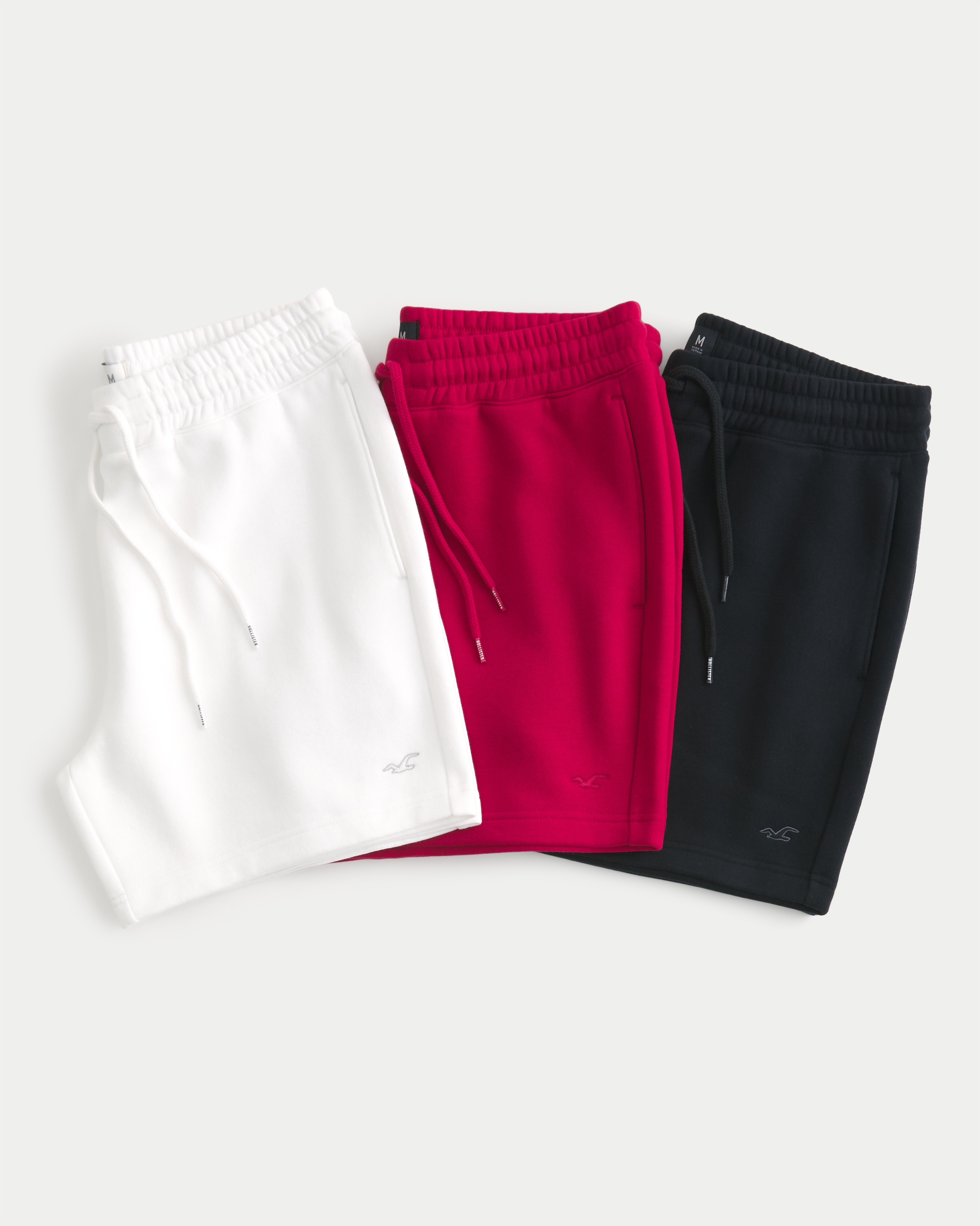 Men s 5 Fleece Icon Shorts 3 Pack in White Red Black Size XS from Hollister