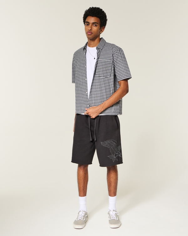 At-the-Knee Eagle Graphic Baggy Fleece Shorts, Black view 1