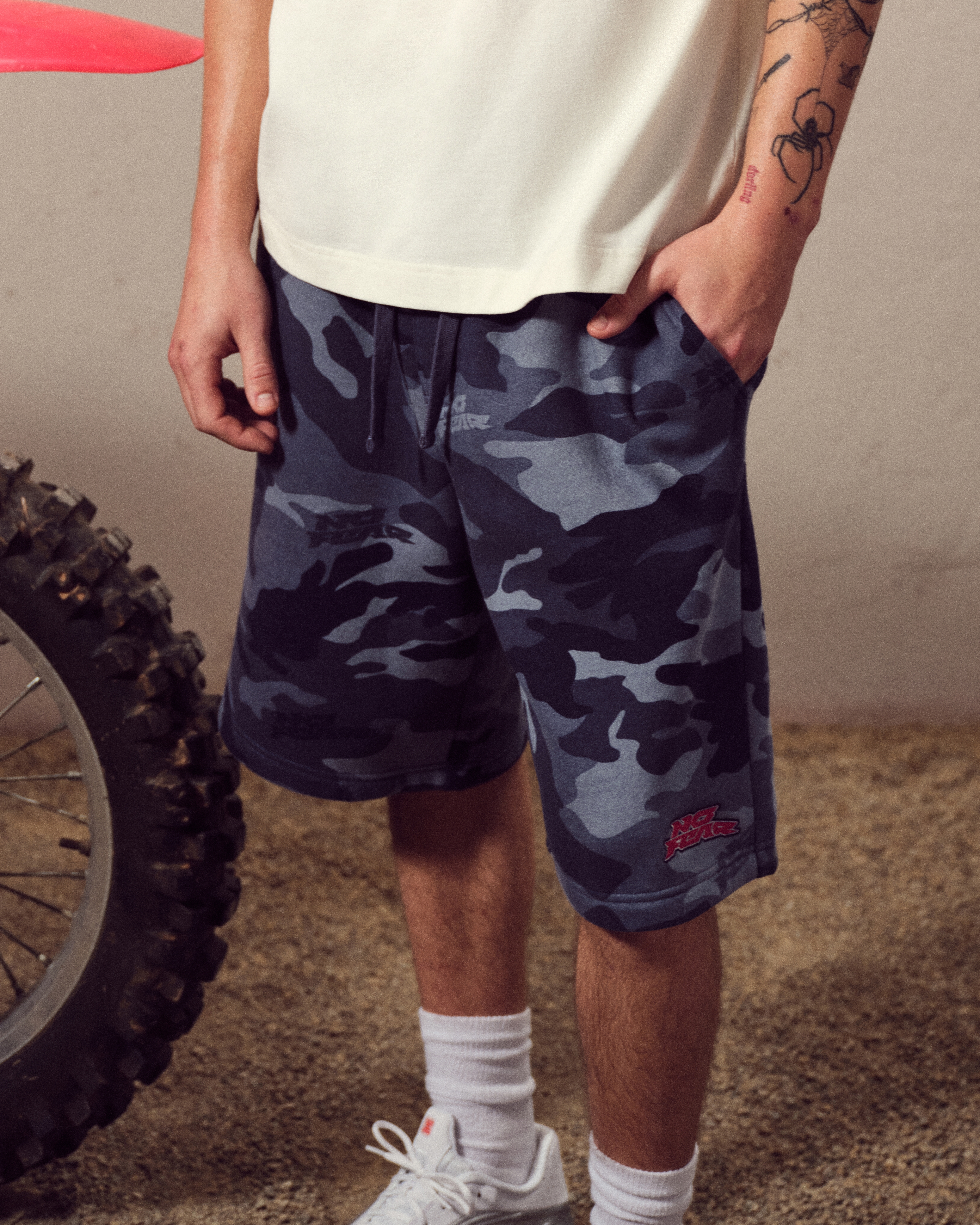 At-the-Knee Camo No Fear Graphic Baggy Fleece Shorts