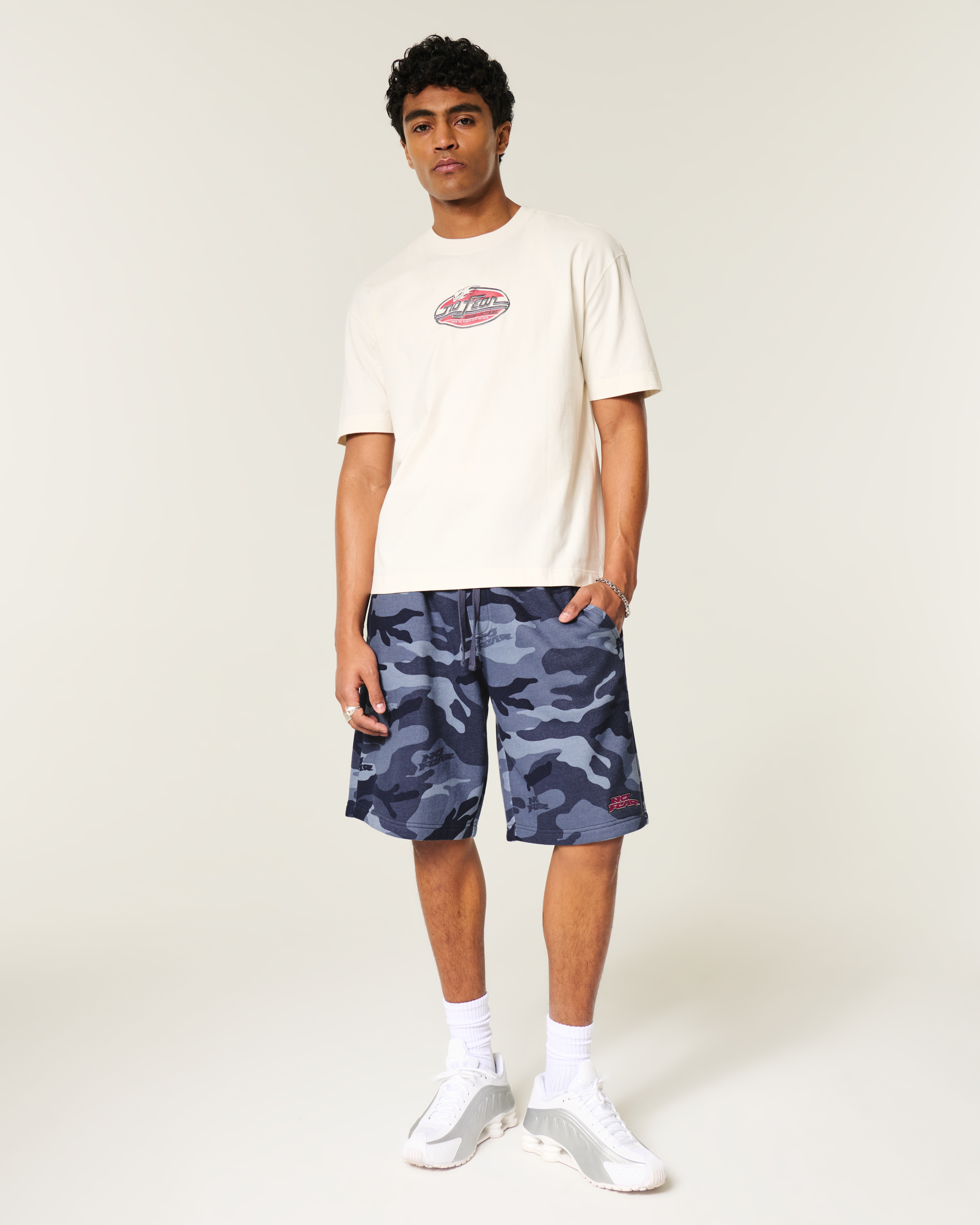 At-the-Knee Camo No Fear Graphic Baggy Fleece Shorts