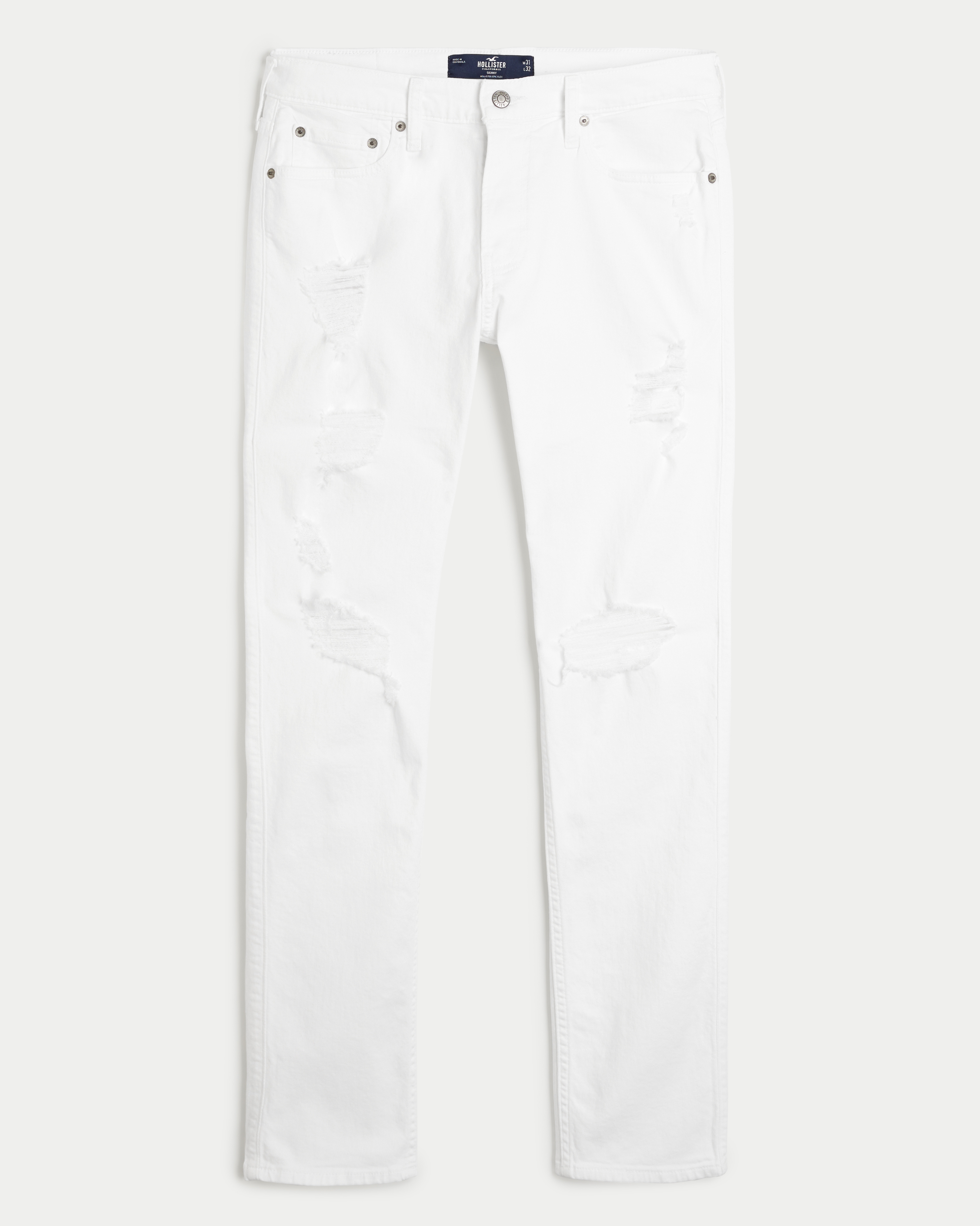 White cut up store jeans