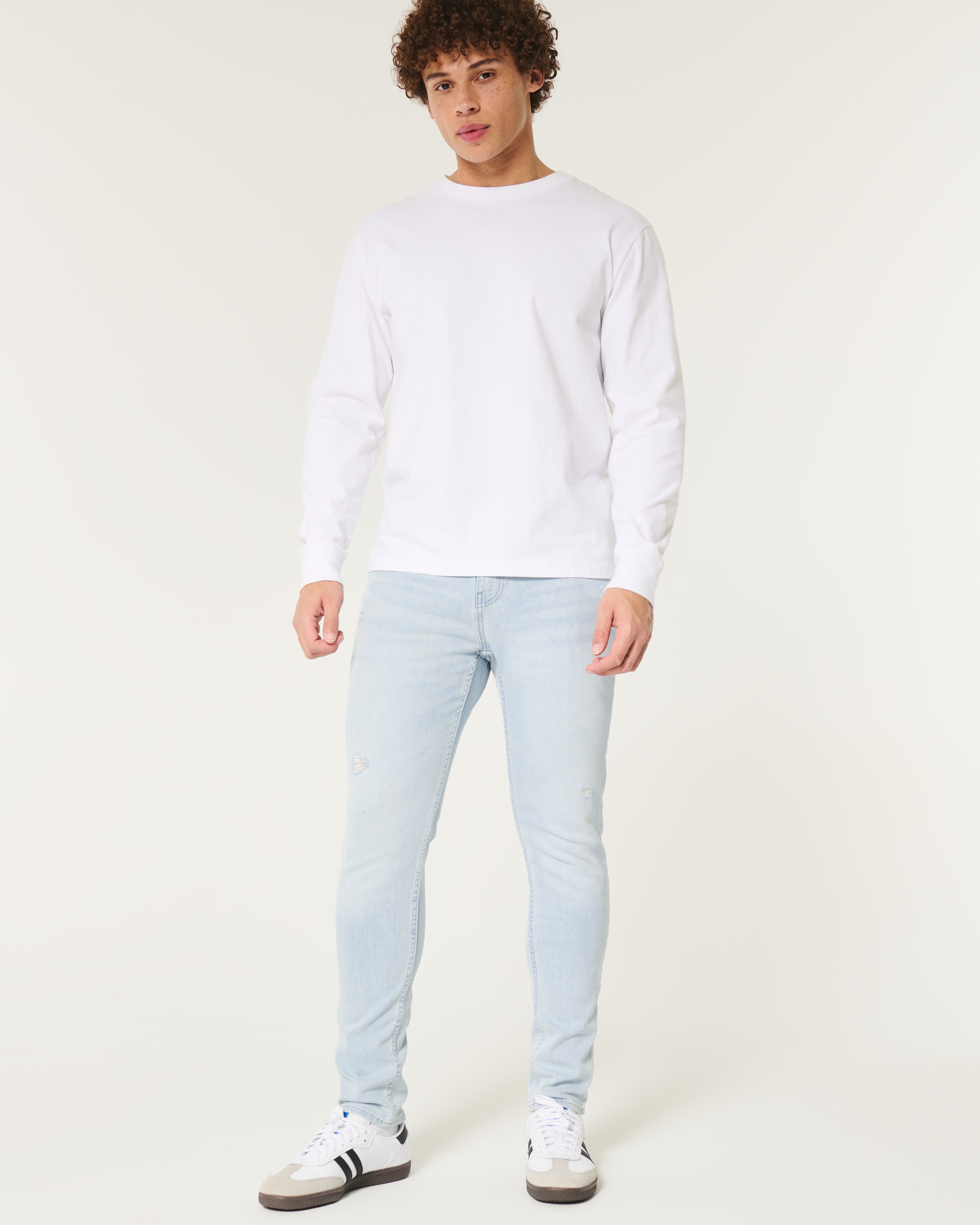 Distressed Light Wash Athletic Skinny Jeans