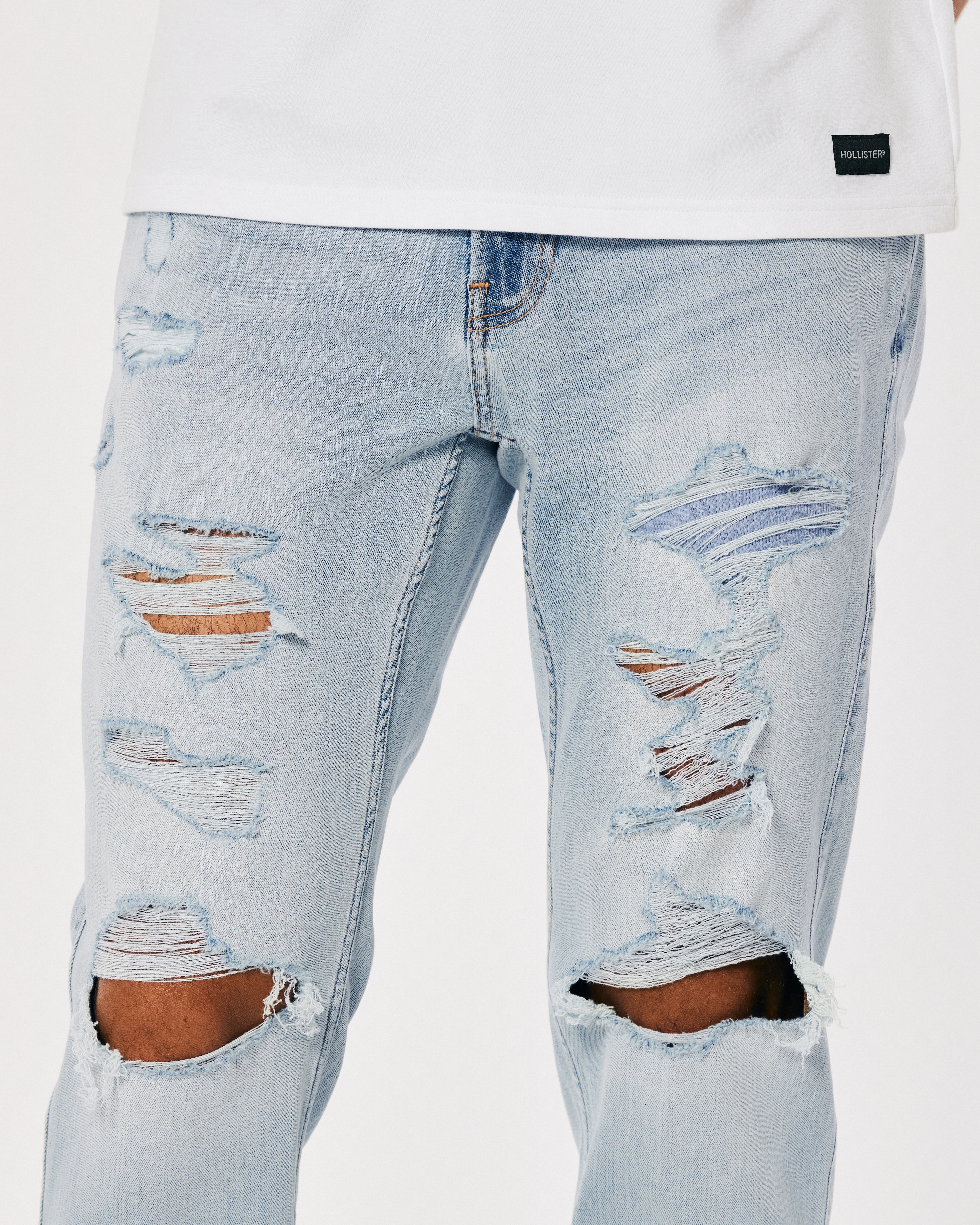 Hollister light blue ripped hot sale jeans