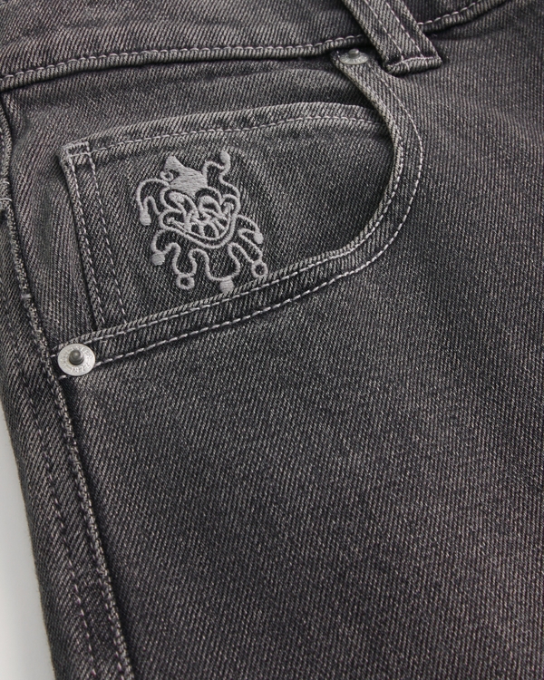 黑色洗水撲克牌小丑圖案板仔風袋裝款牛仔褲