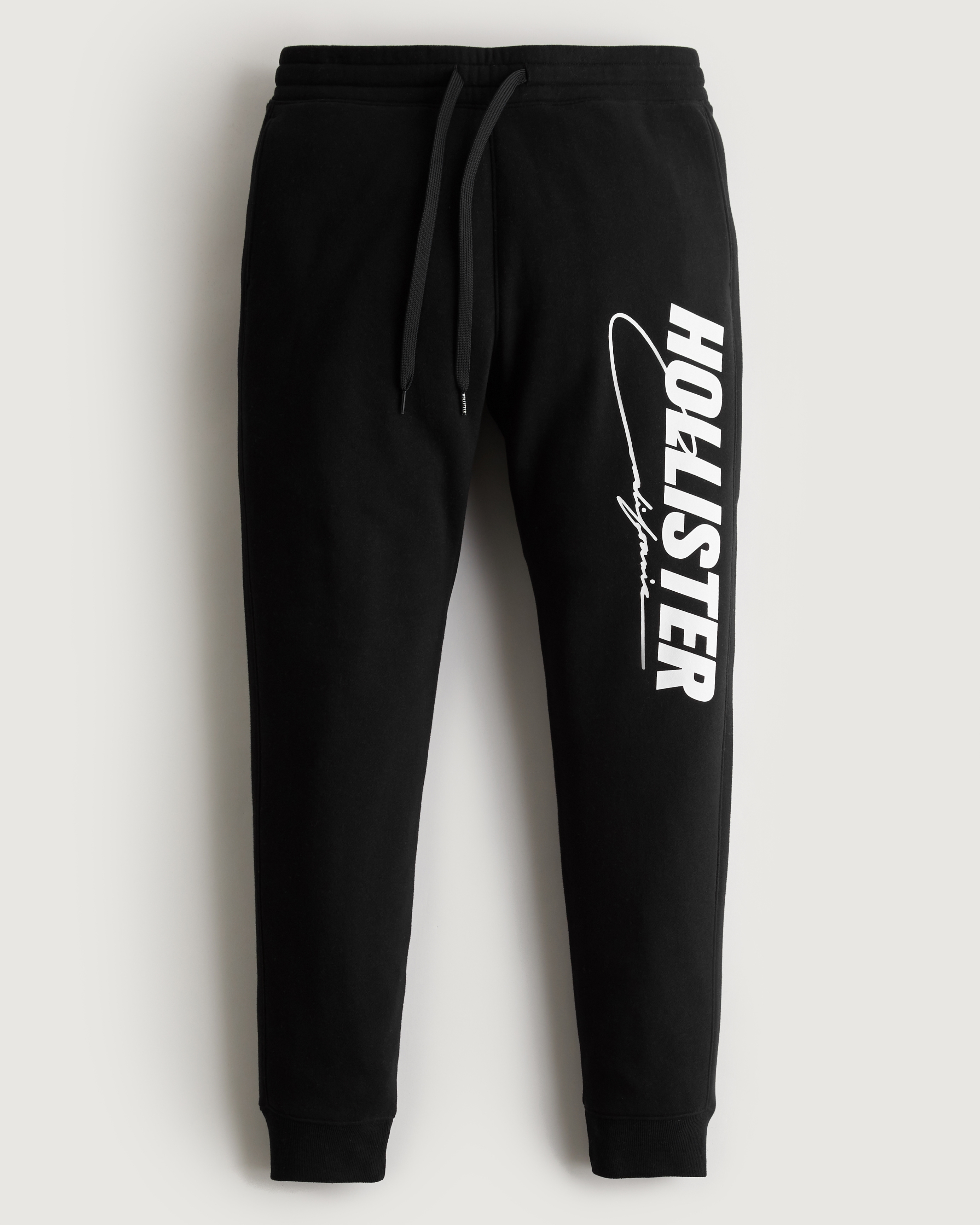 Hollister Co. FLEECE LOGO JOGGERS - Tracksuit bottoms - BLACK/black 