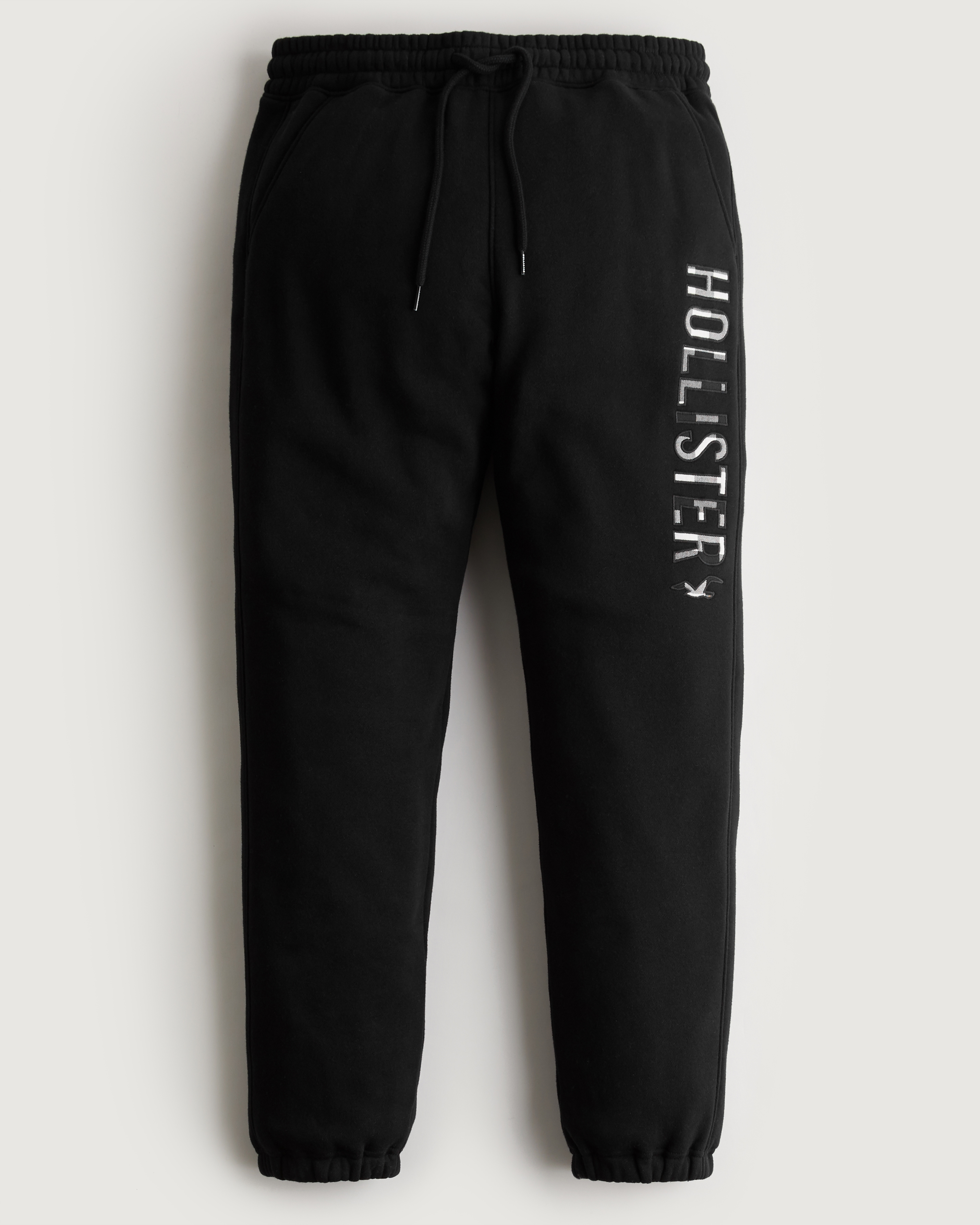 Hollister Co. LOGO FLEGGING - Tracksuit bottoms - navy/dark blue 