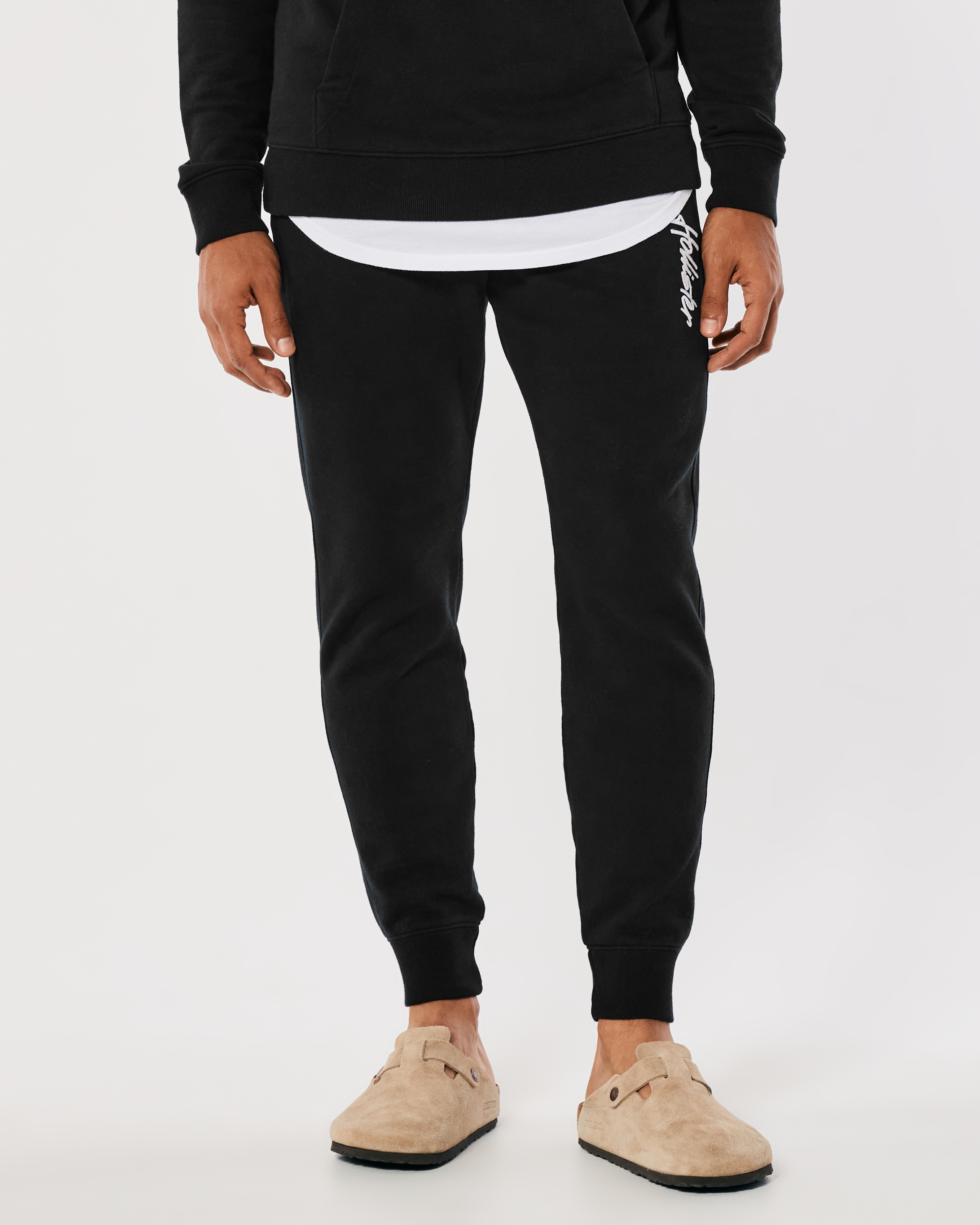 Hollister Co. FLEECE LOGO JOGGERS - Tracksuit bottoms - BLACK/black 