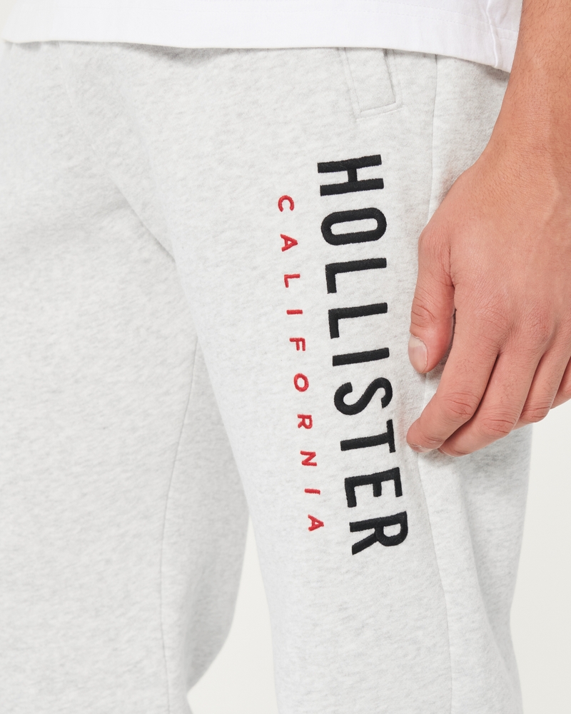 Hollister Logo Graphic Banded Sweatpants ($40) ❤ liked on Polyvore  featuring activewear, activewear pants, bla…