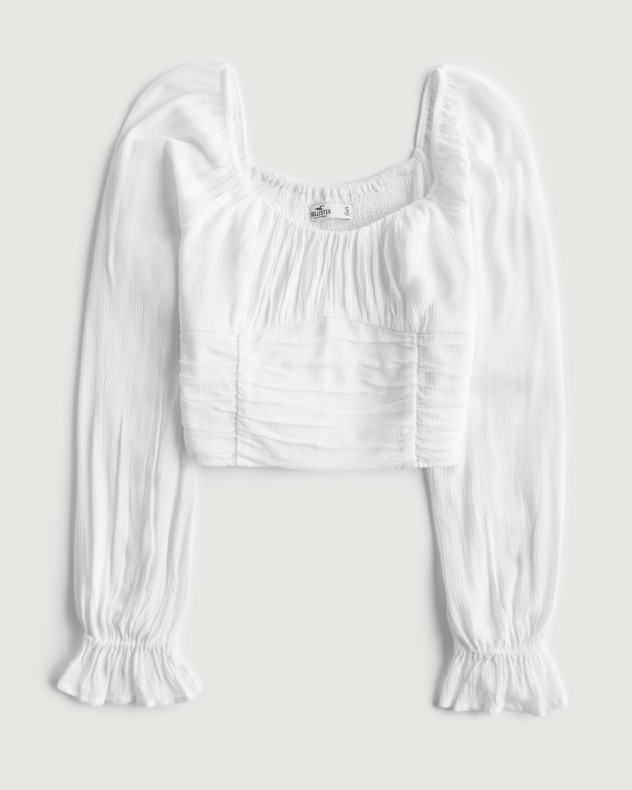 white long sleeve cinched top