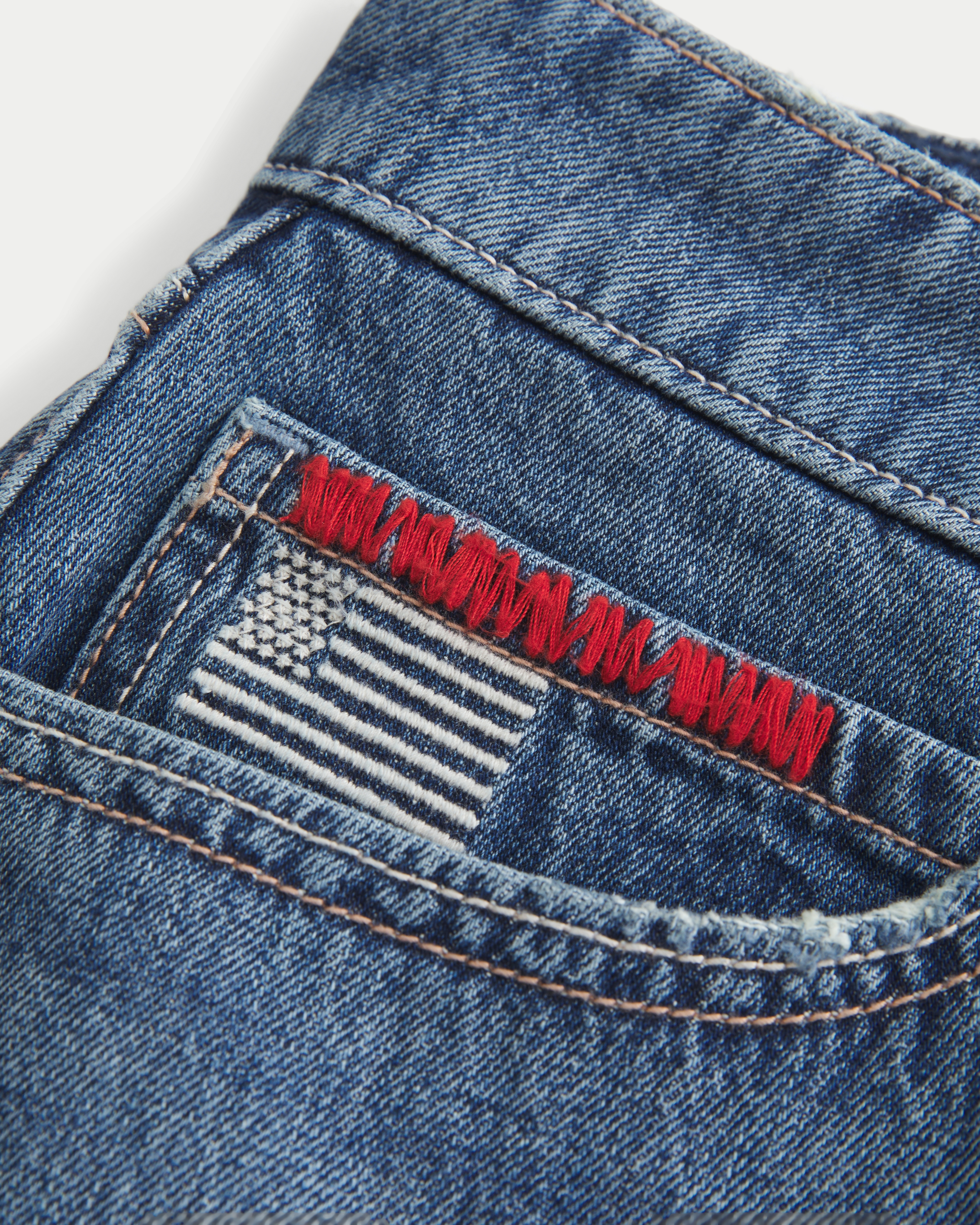 Hollister Low-rise Medium Wash Flag Embroidered Denim Mini Skort