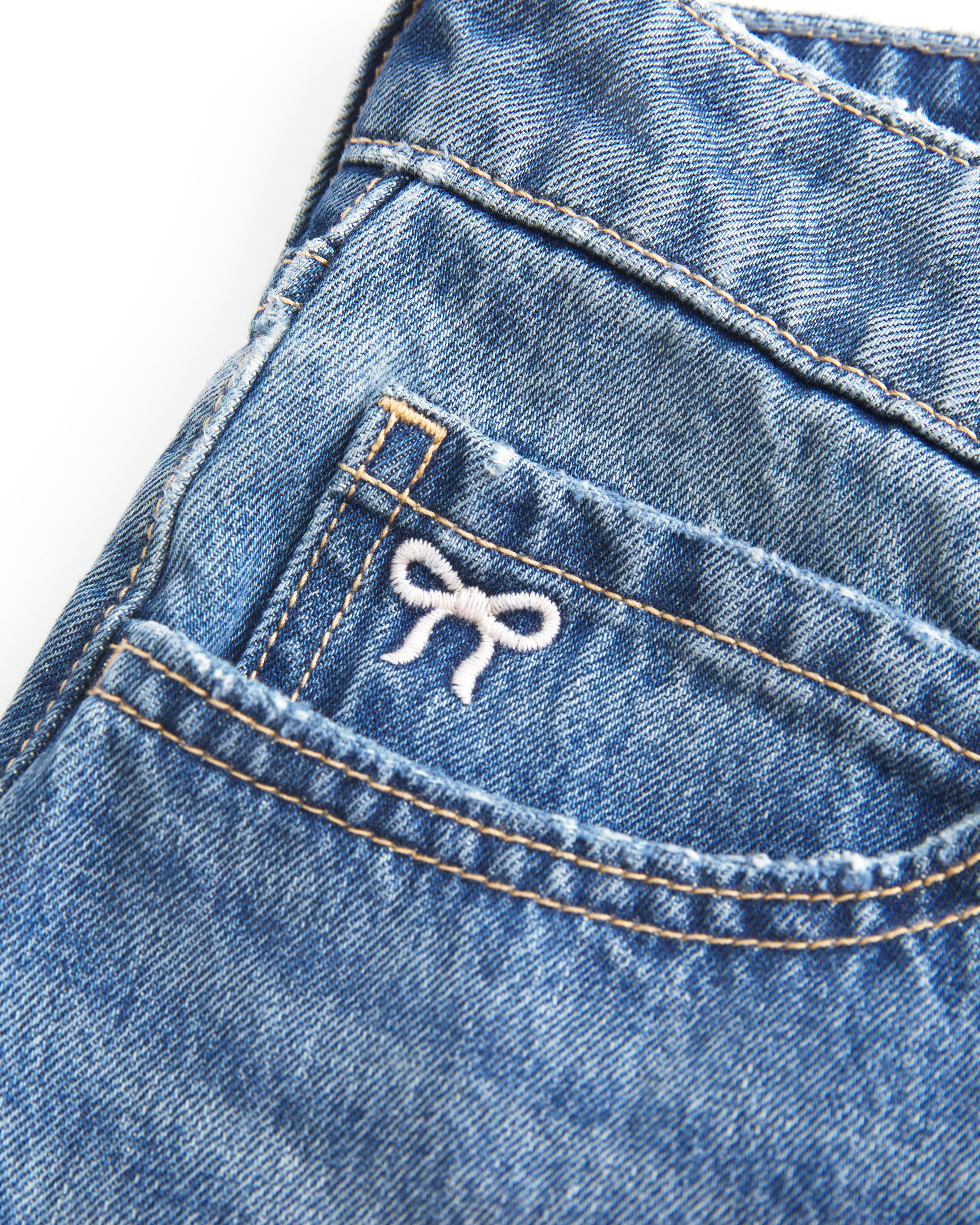 Low-Rise Embroidered Bow Denim Mini Skort