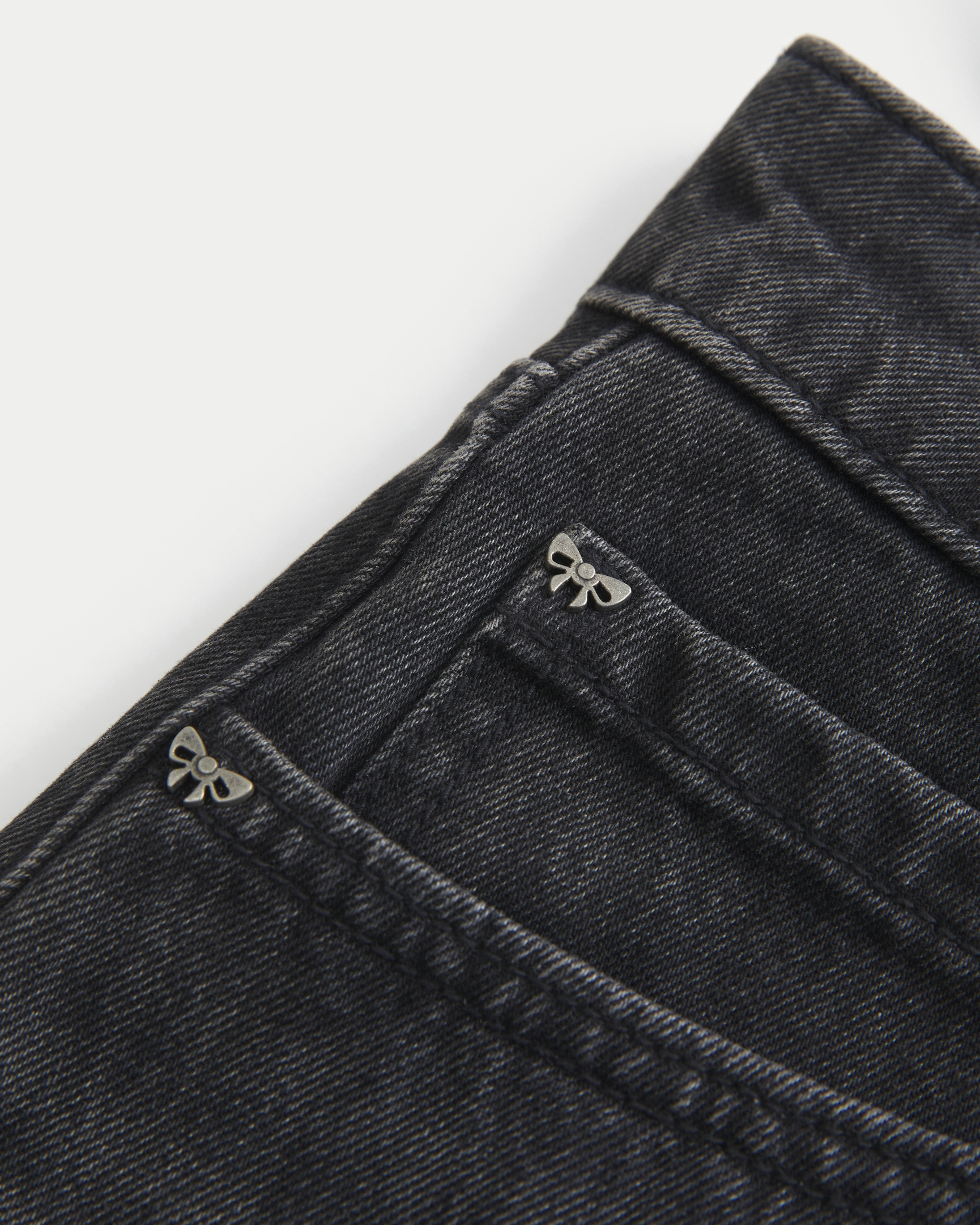 Low-Rise Washed Black Denim Mini Skort