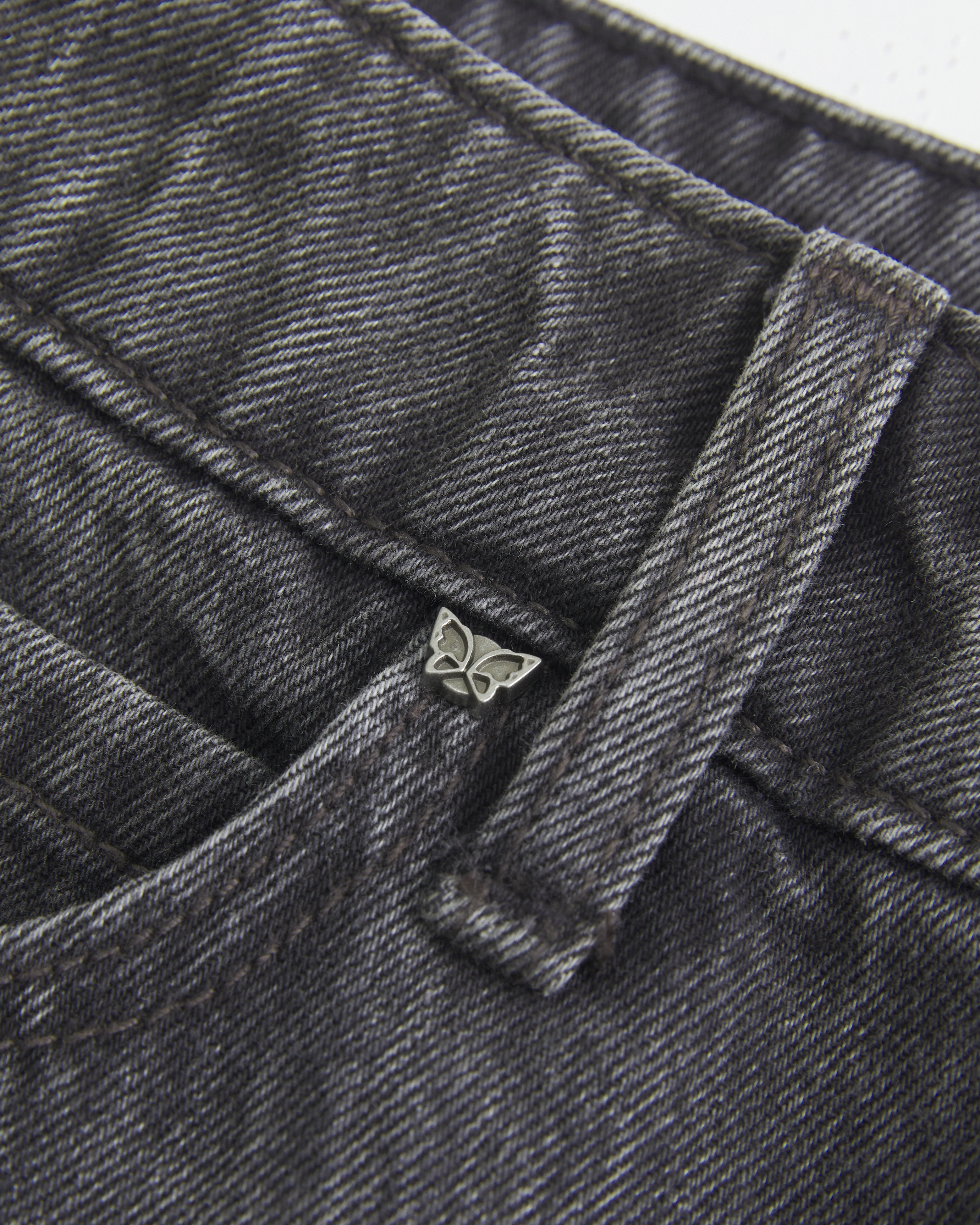 Low-Rise Washed Black Denim Mini Skort