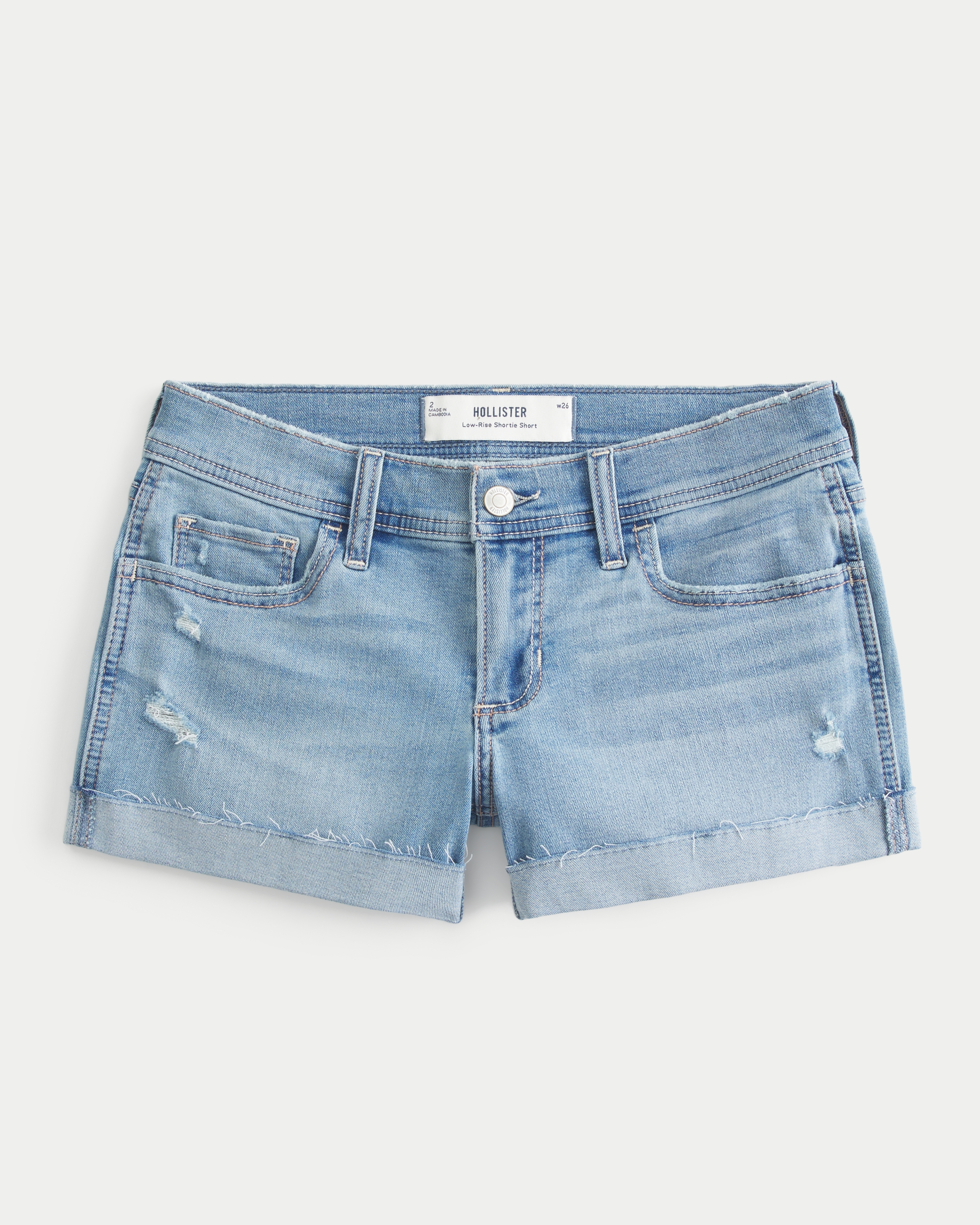 Low-Rise Ripped Light Wash Denim Shortie Shorts