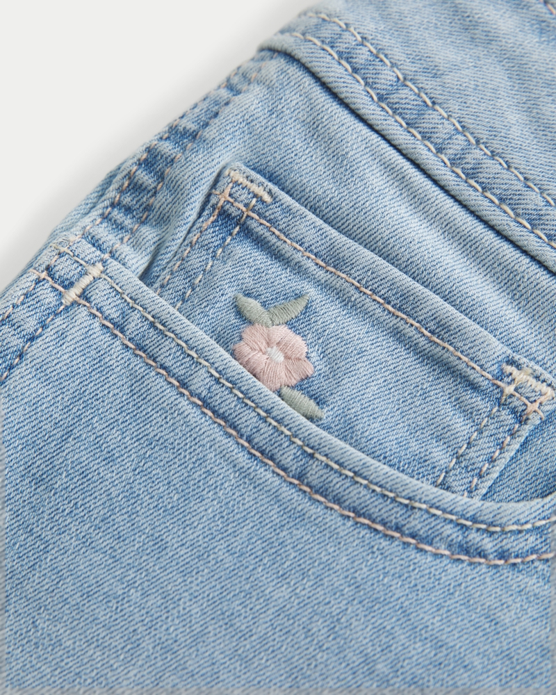 Curvy Low-Rise Light Wash Floral Embroidered Denim Shortie Shorts