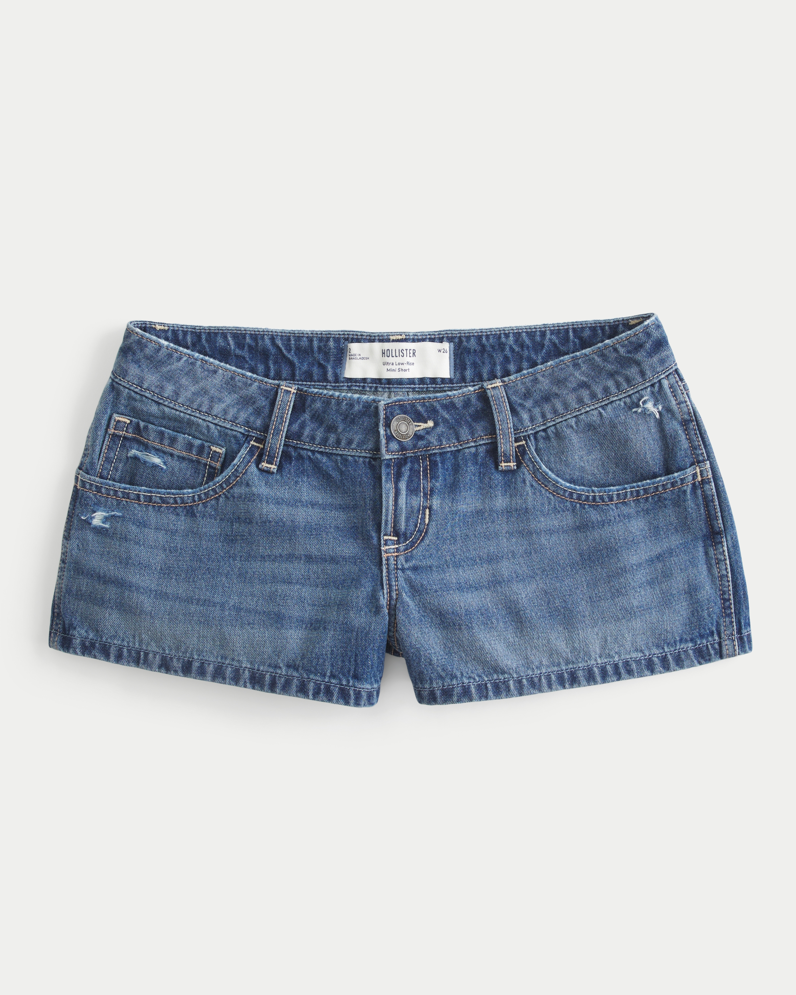 Ultra Low-Rise Distressed Medium Wash Denim Mini Shorts