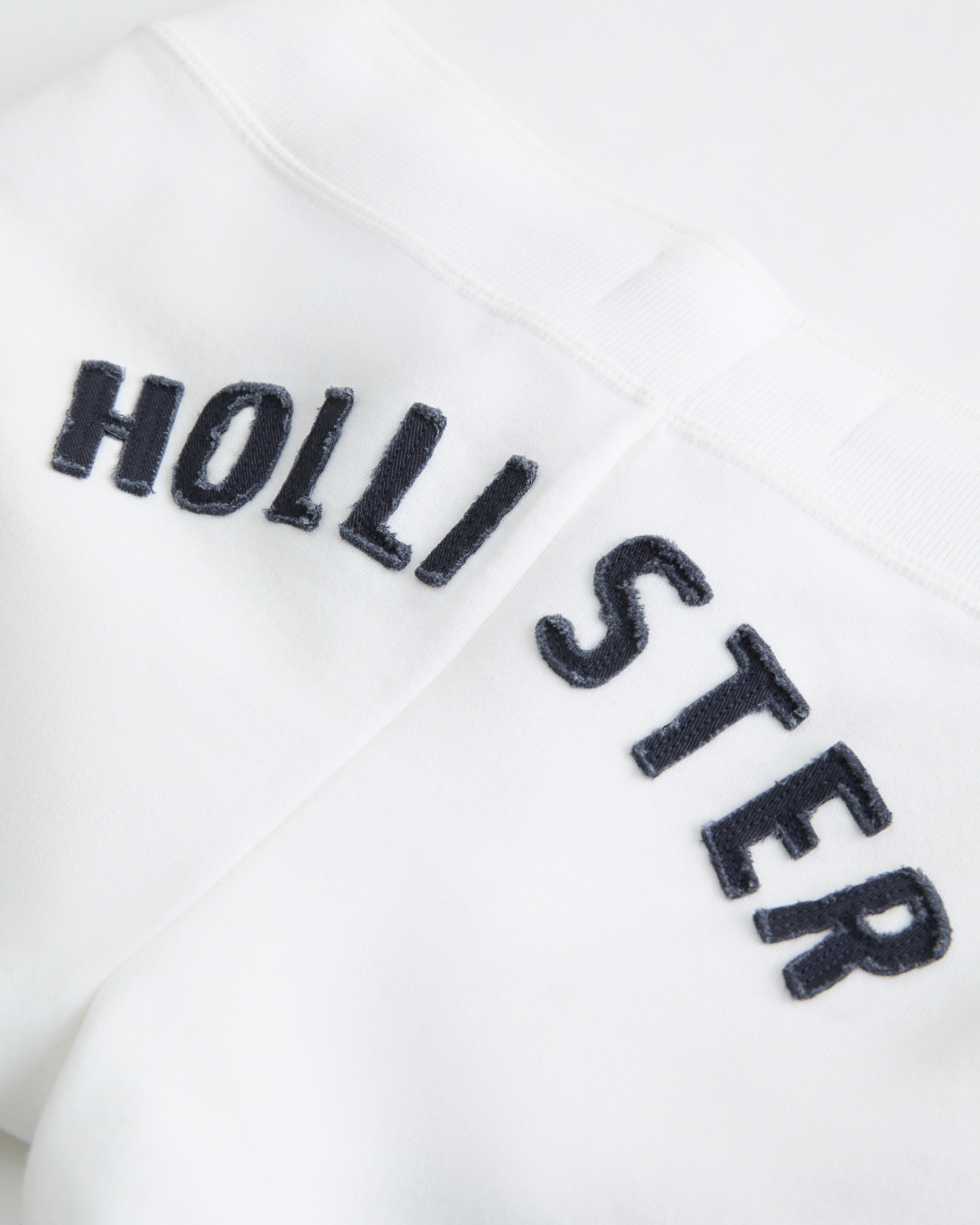 Ultra Low-Rise Logo Graphic Fleece Shortie Shorts