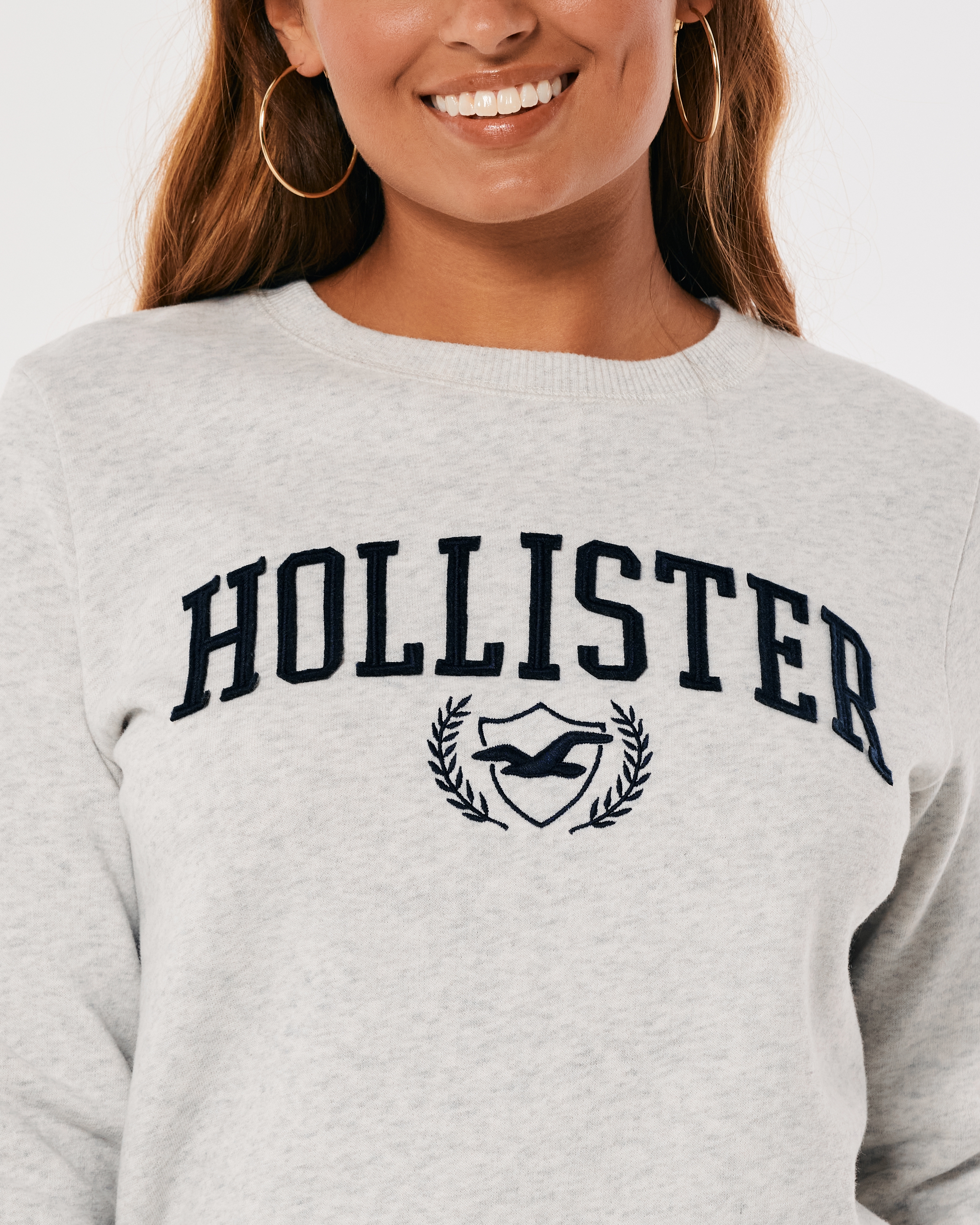 Hollister front logo knitted crew neck sweater in white