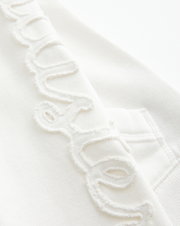 フェイクファー トリムロゴグラフィック ジップアップフーディー フェイクファー トリムロゴグラフィック ジップアップフーディー