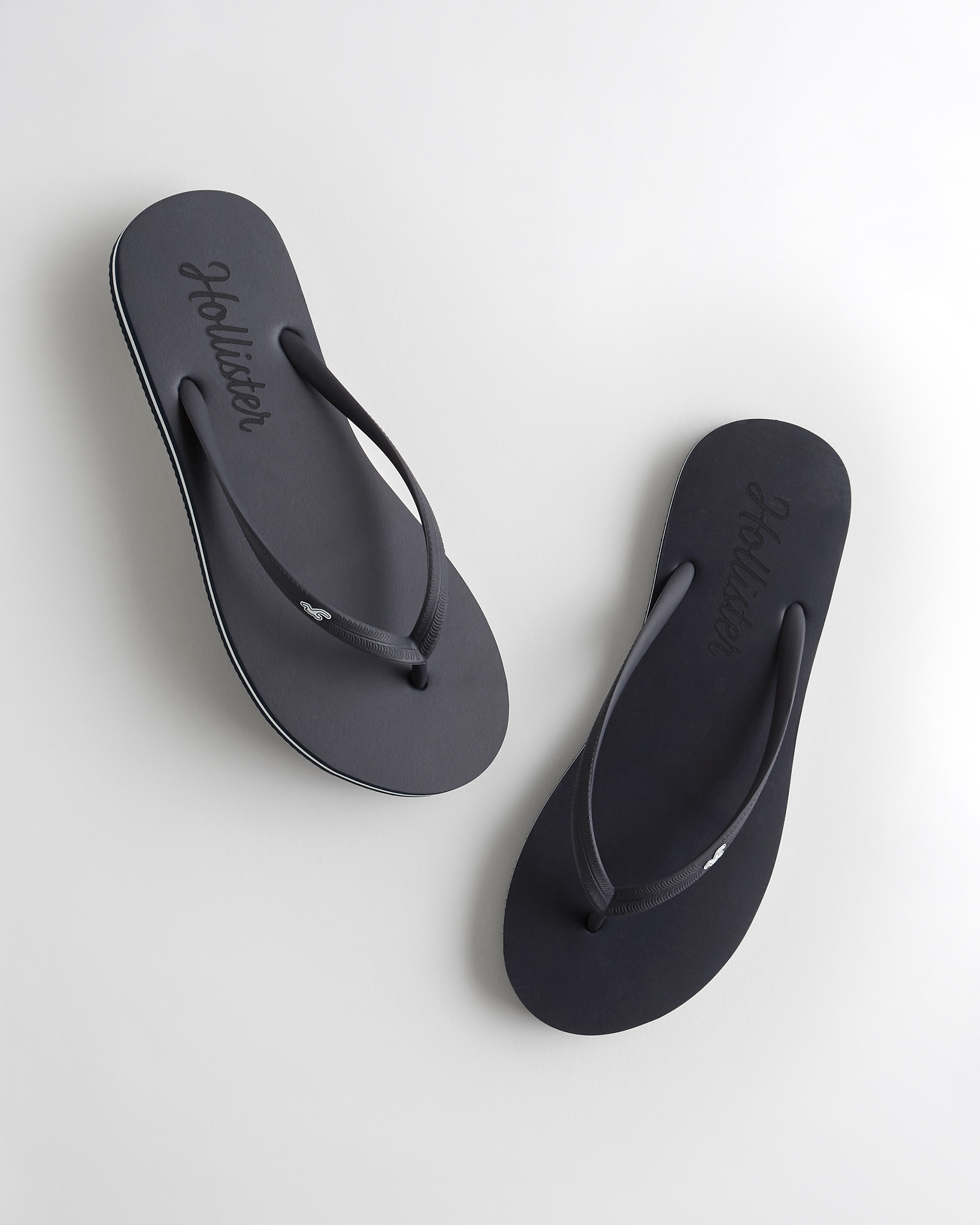 hollister black flip flops