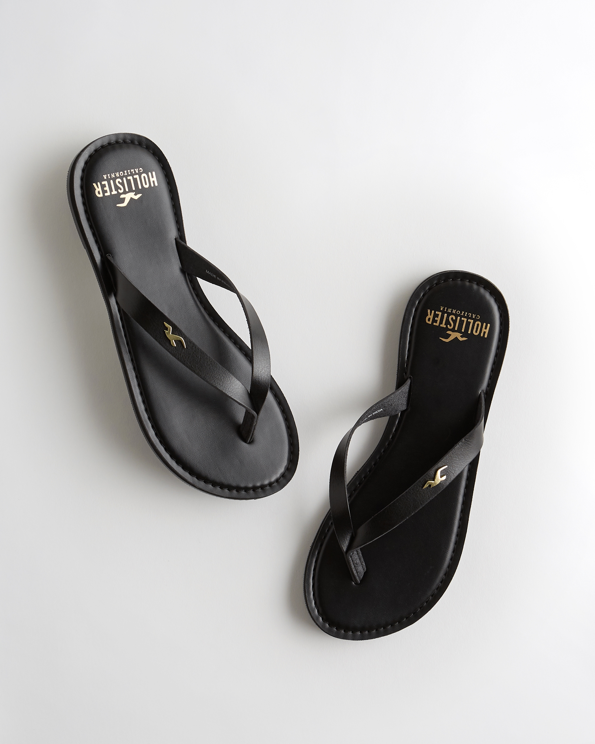 hollister black flip flops