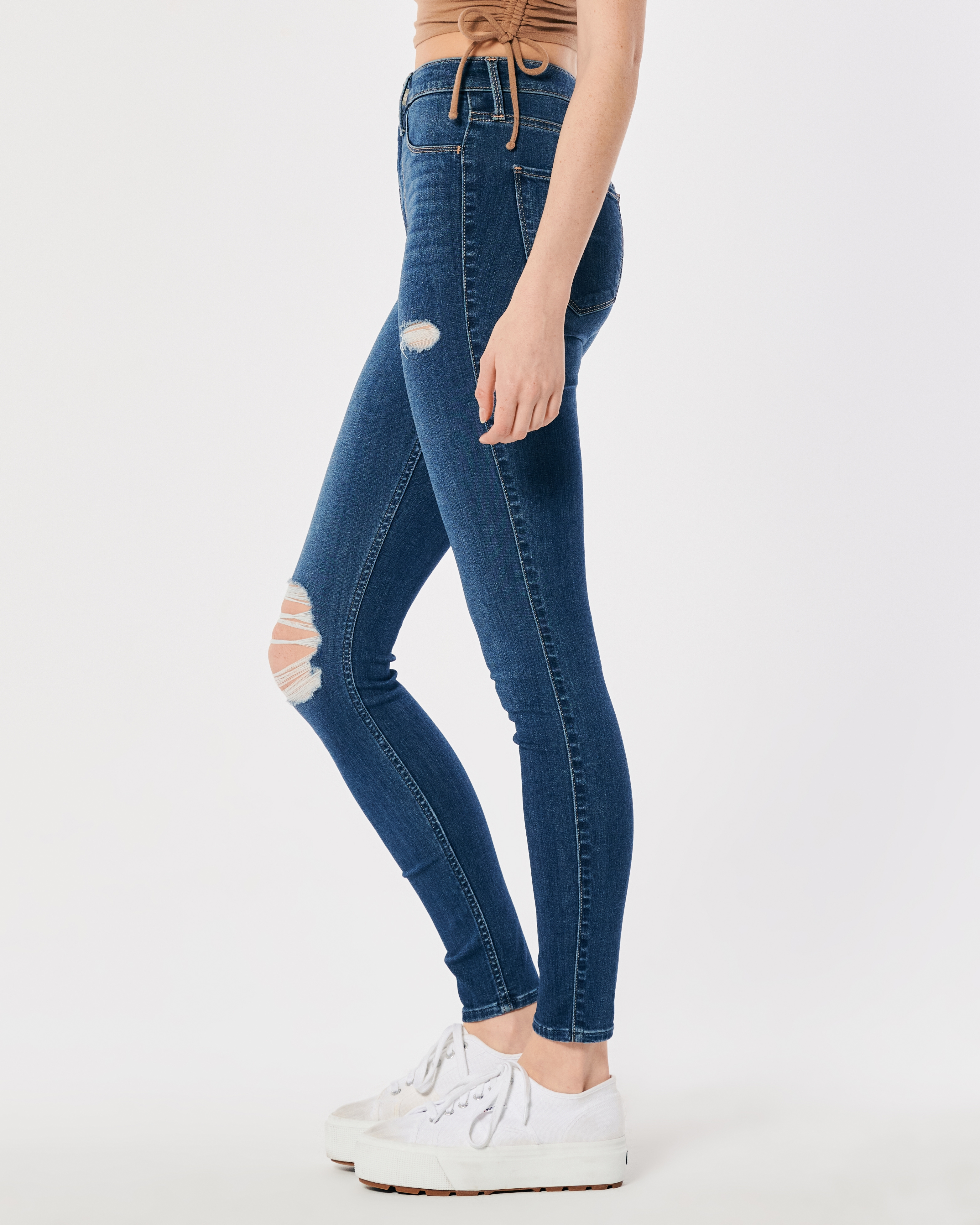Ultra High-Rise Ripped Medium Wash Jean Leggings
