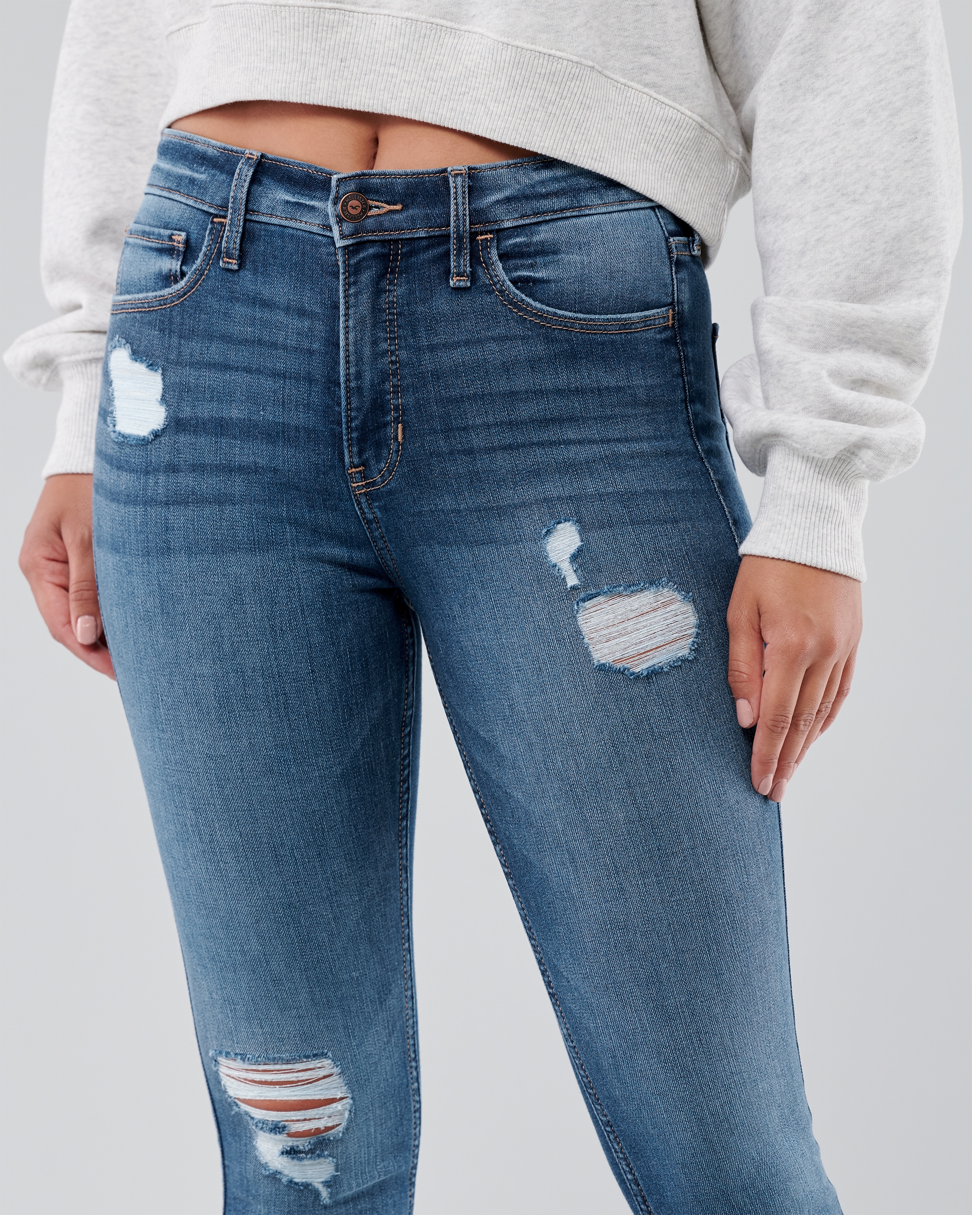 High-Rise Ripped Medium Wash Super Skinny Jeans