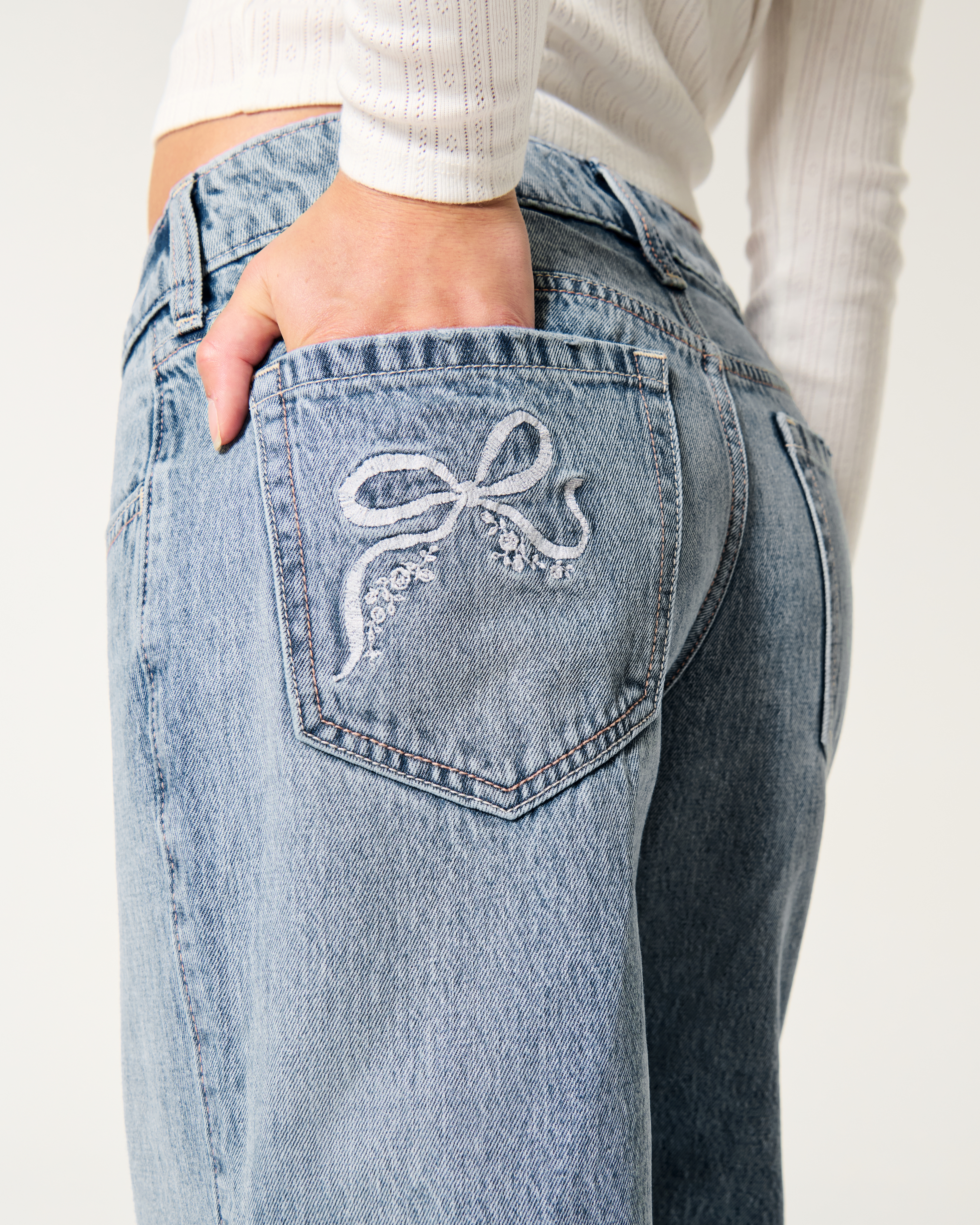 Women s Low Rise Medium Wash Embroidered Bow Baggy Jeans Women s New Arrivals HollisterCo