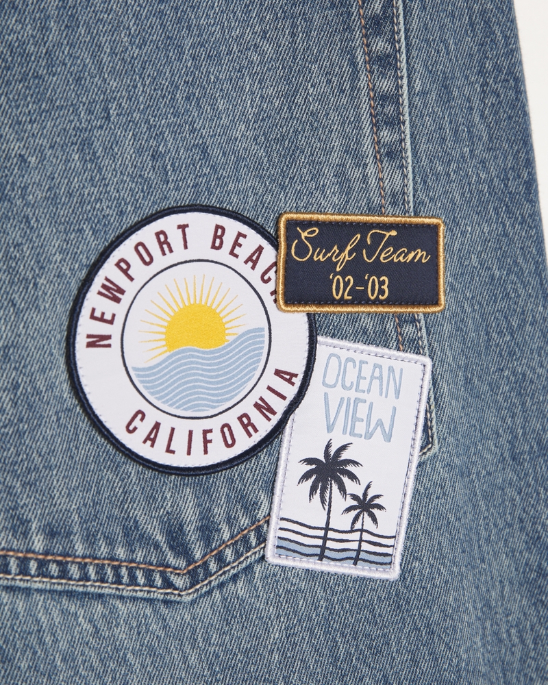 Low-Rise Medium Wash Graphic Patch Extreme Baggy Jeans