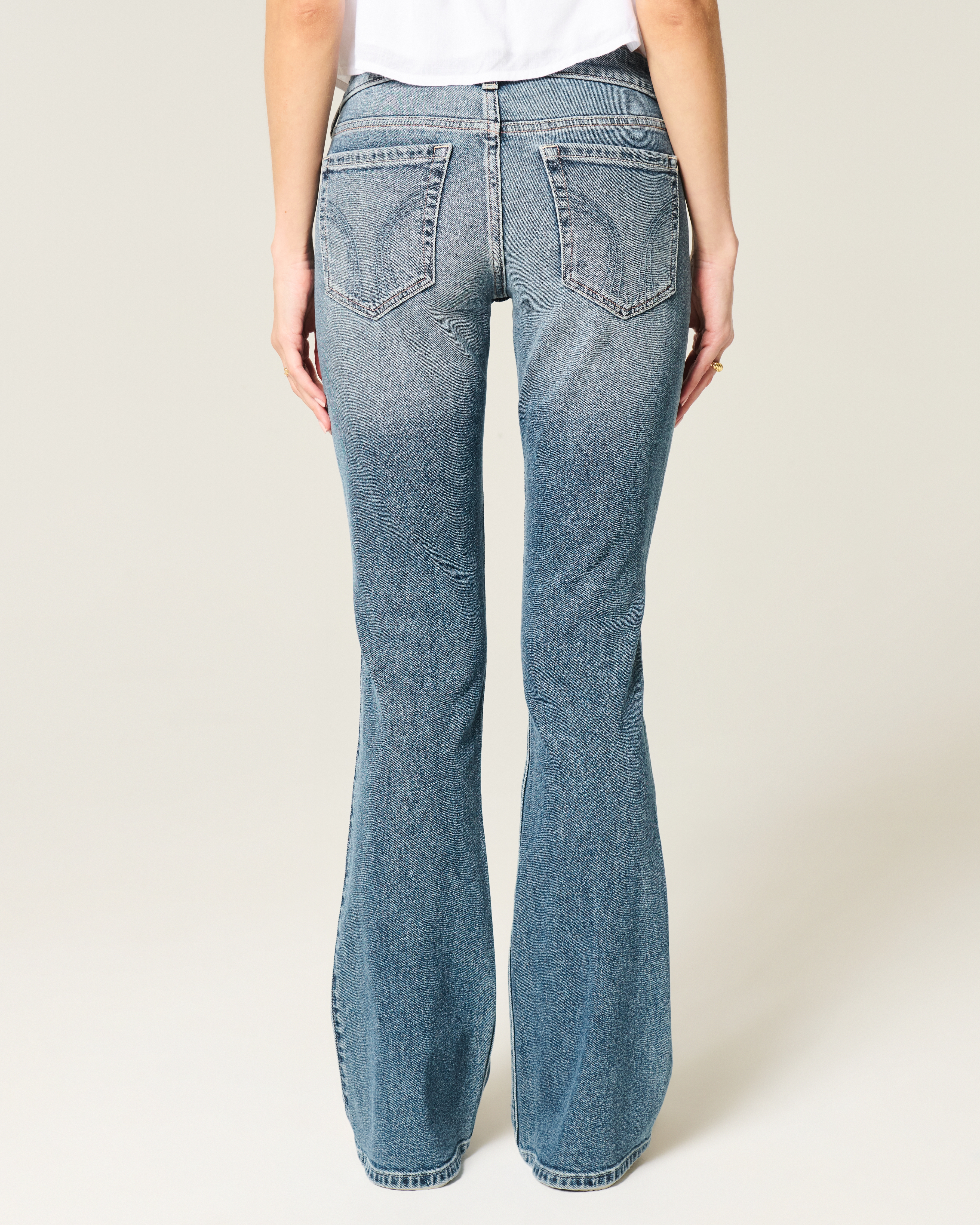 Low-Rise Distressed Medium Wash Boot Jeans
