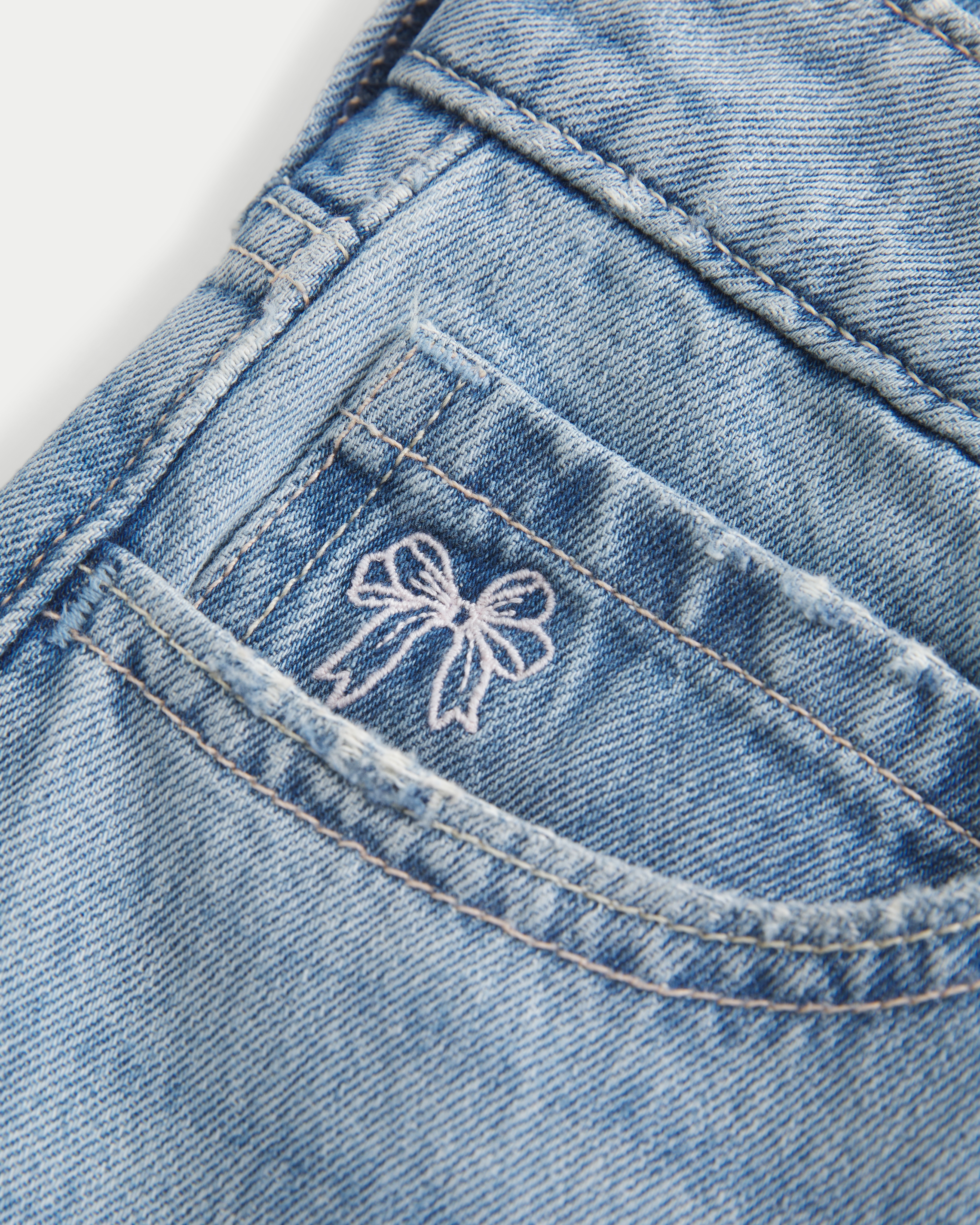Low-Rise Light Wash Embroidered Bows Baggy Jeans