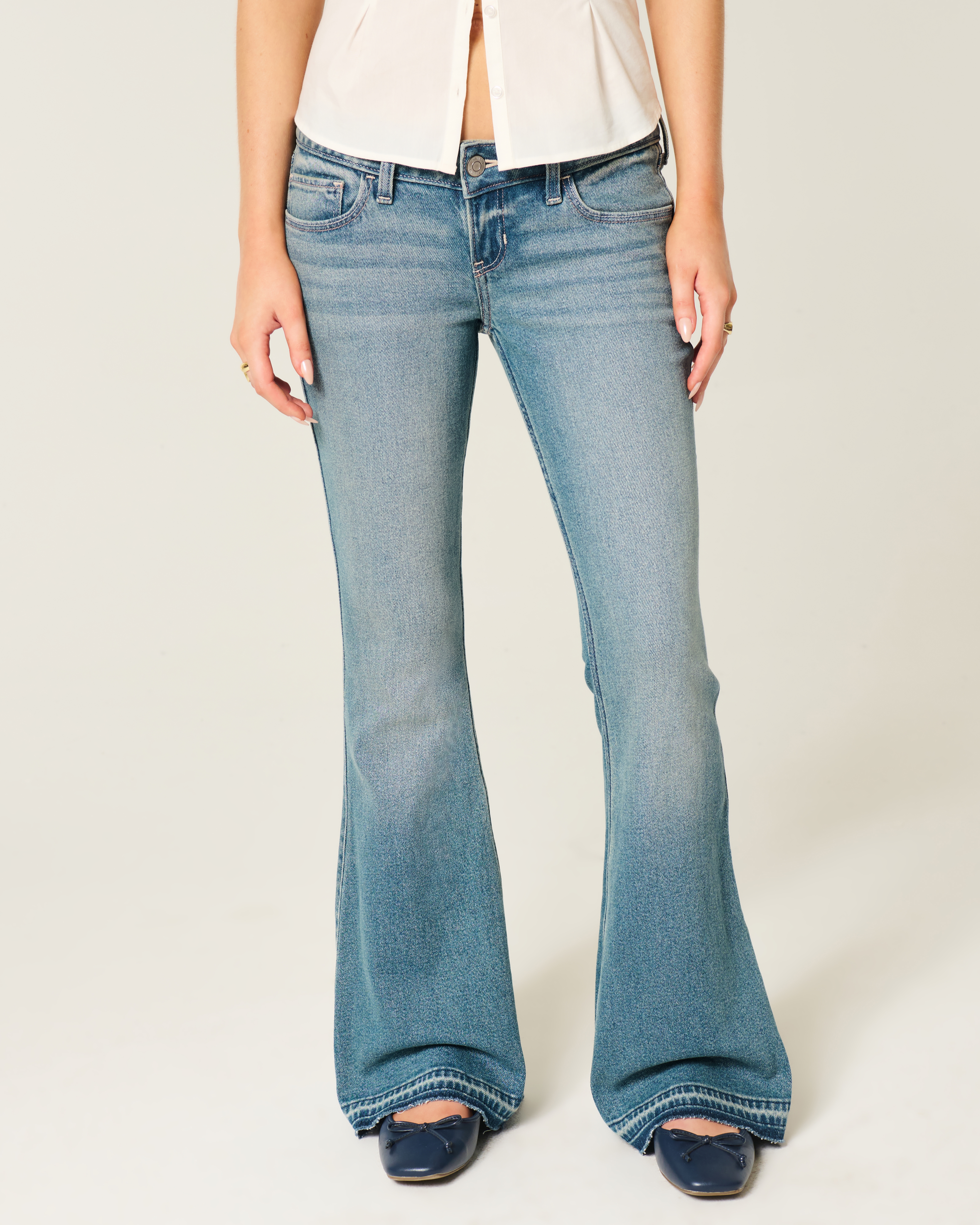 Ultra Low-Rise Medium Wash Flare Jeans