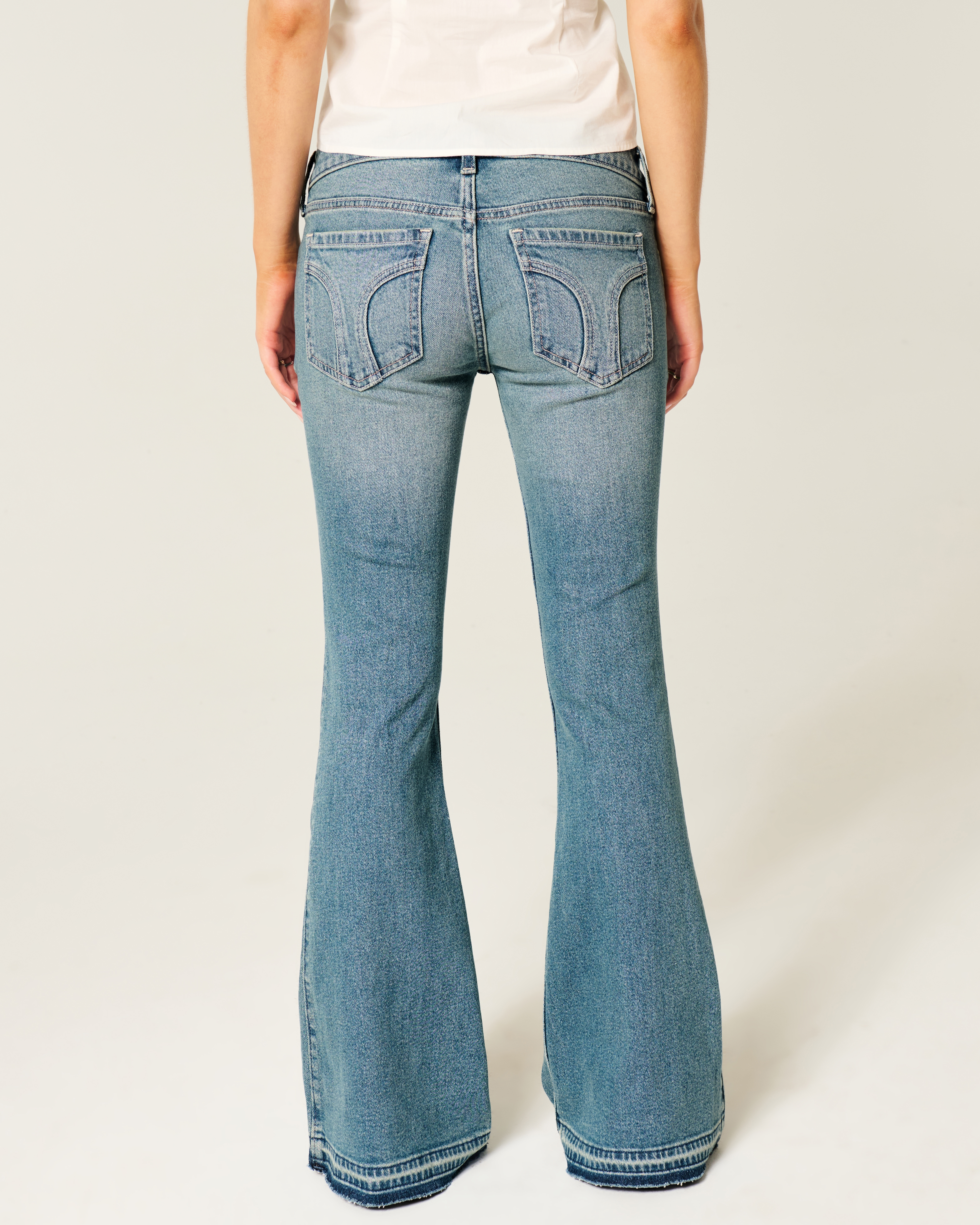 Ultra Low-Rise Medium Wash Flare Jeans