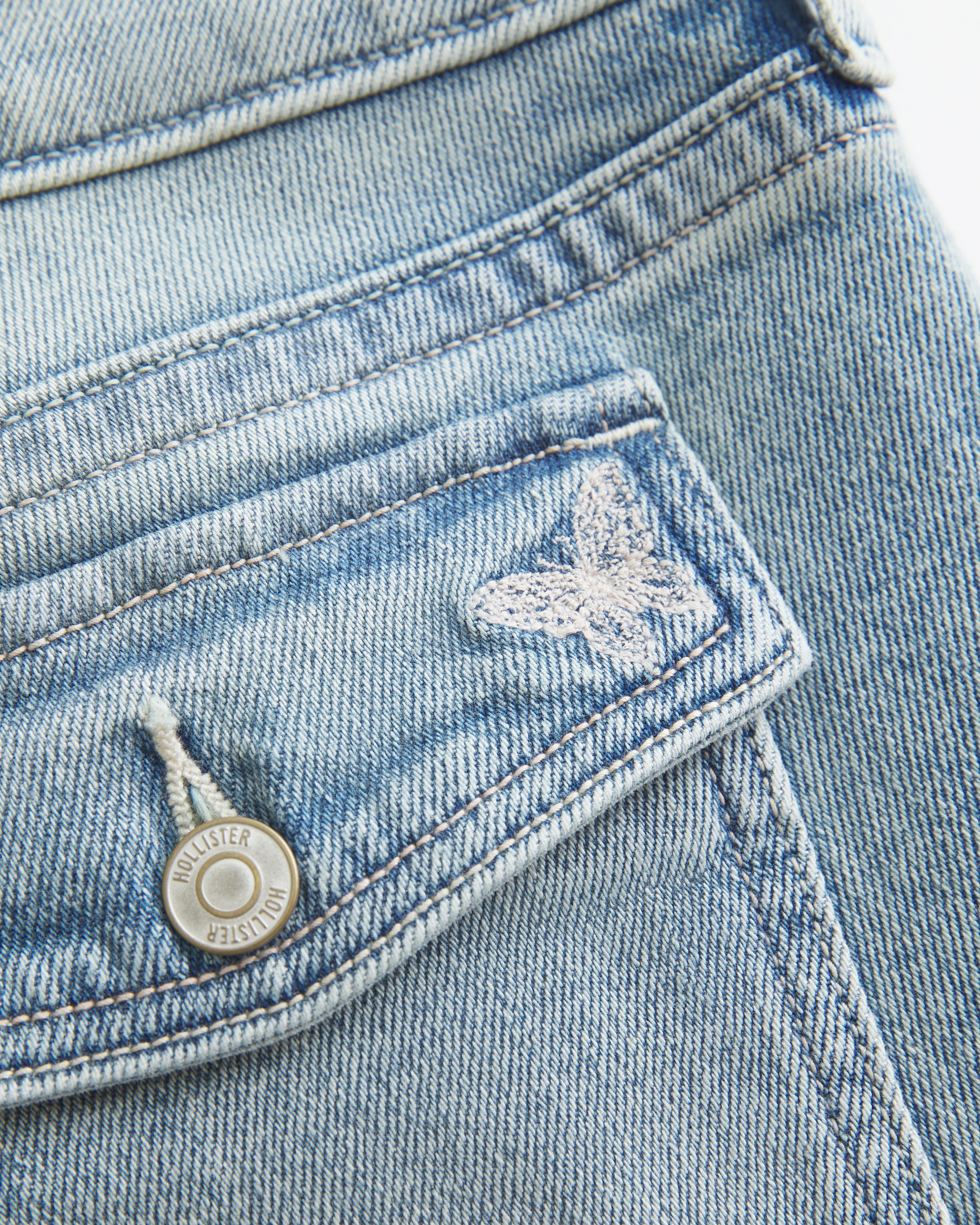 Low-Rise Medium Wash Embroidered Butterfly Boot Jeans