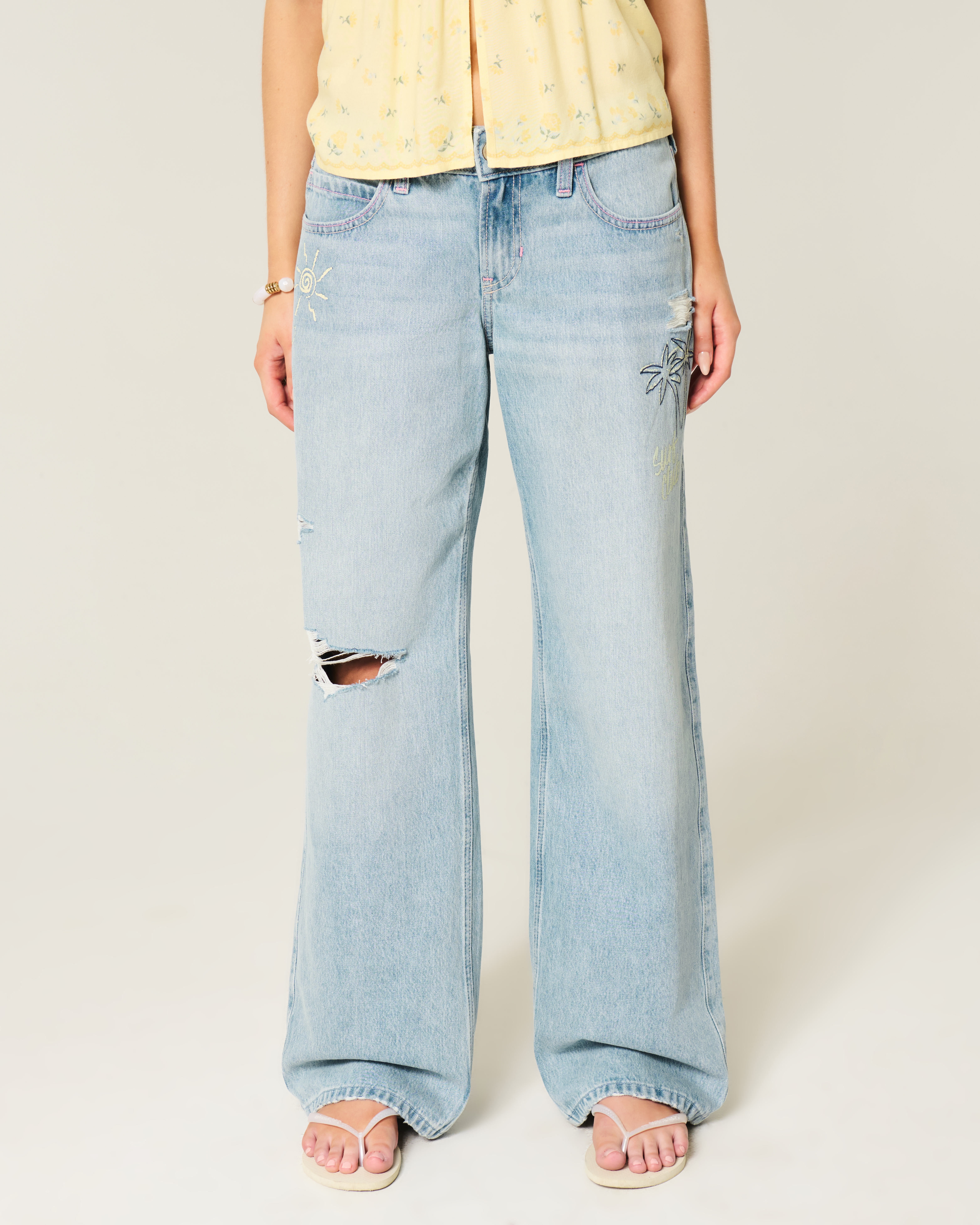 Low-Rise Ripped Light Wash Graphic Baggy Jeans