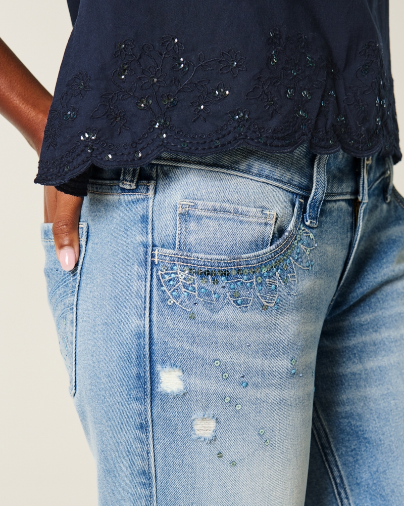 Ultra Low-Rise Distressed Light Wash Sequin Flare Jeans