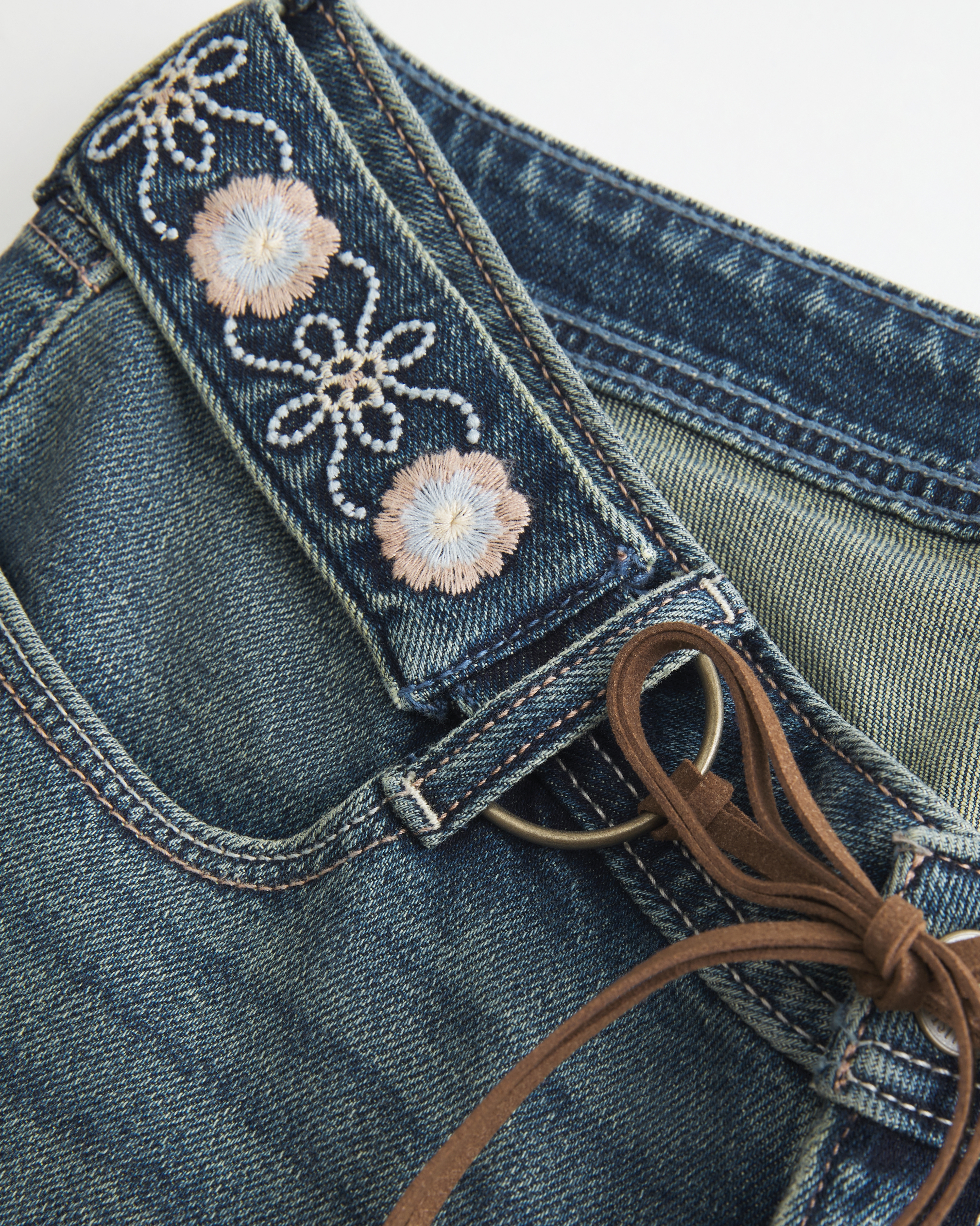Ultra Low-Rise Embroidered Belt Medium Wash Flare Jeans