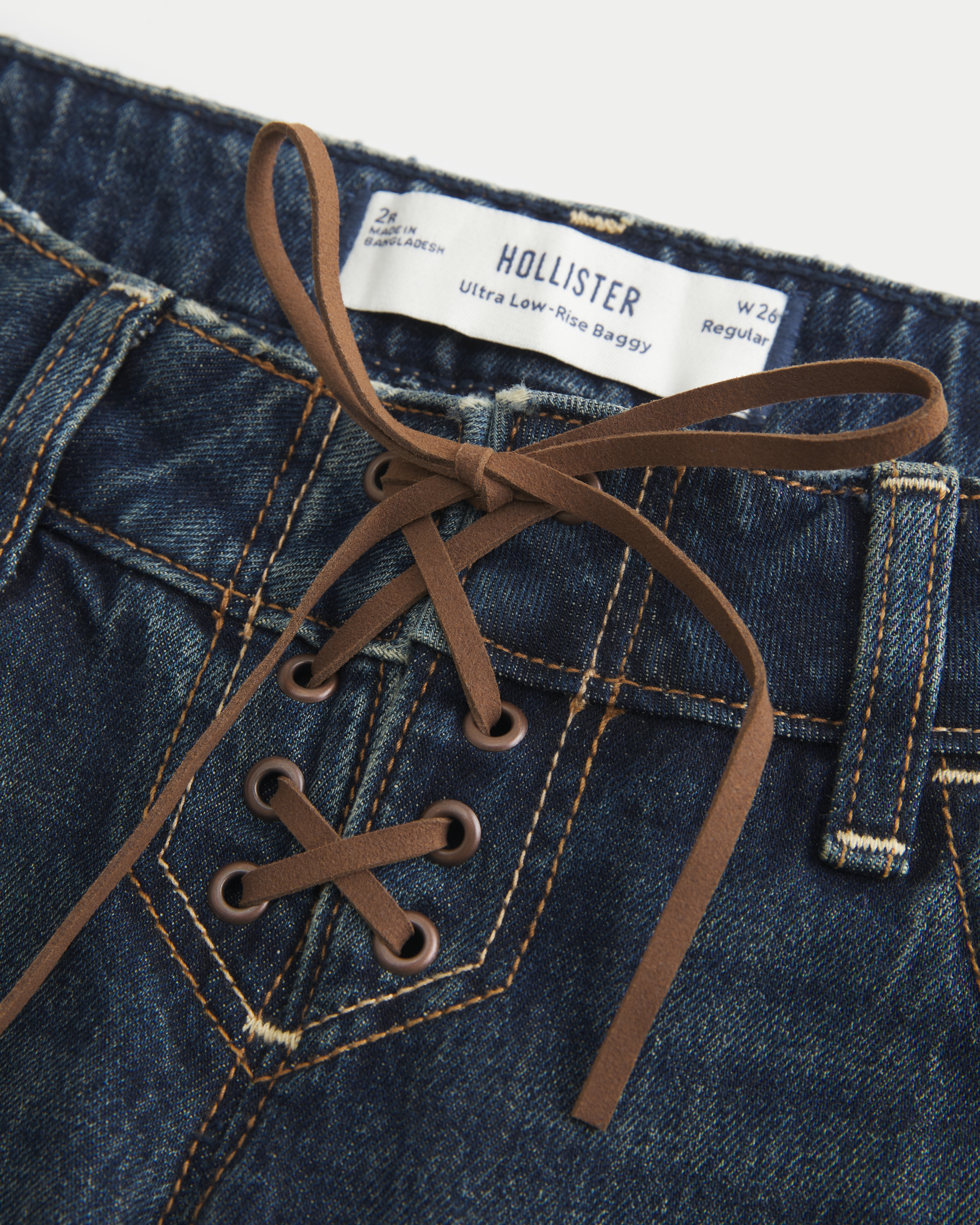 Ultra Low-Rise Dark Wash Lace-Up Baggy Jeans