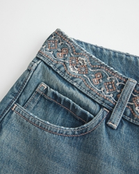 Ultra Low-Rise Medium Wash Embroidered Waist Baggy Jeans