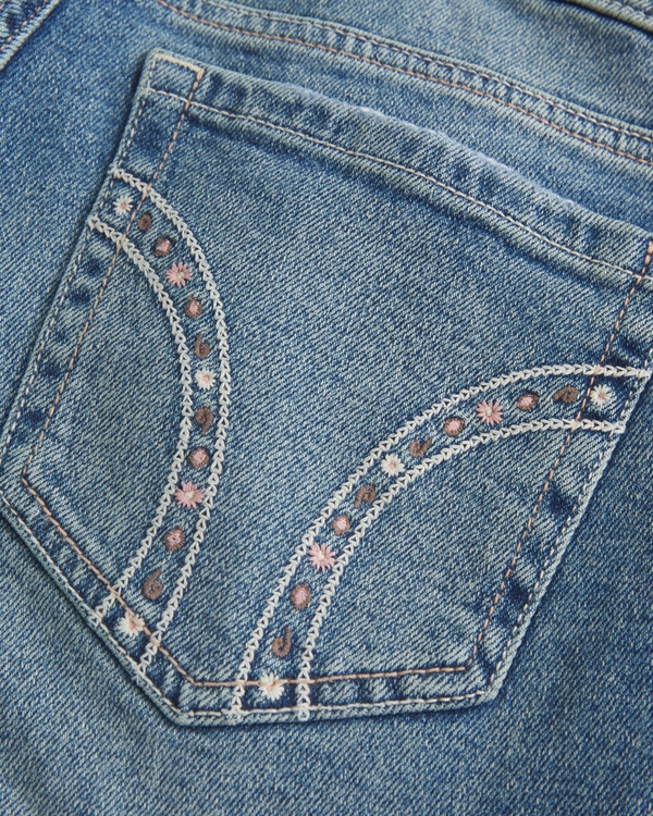 Ultra Low-Rise Medium Wash Flare Jeans