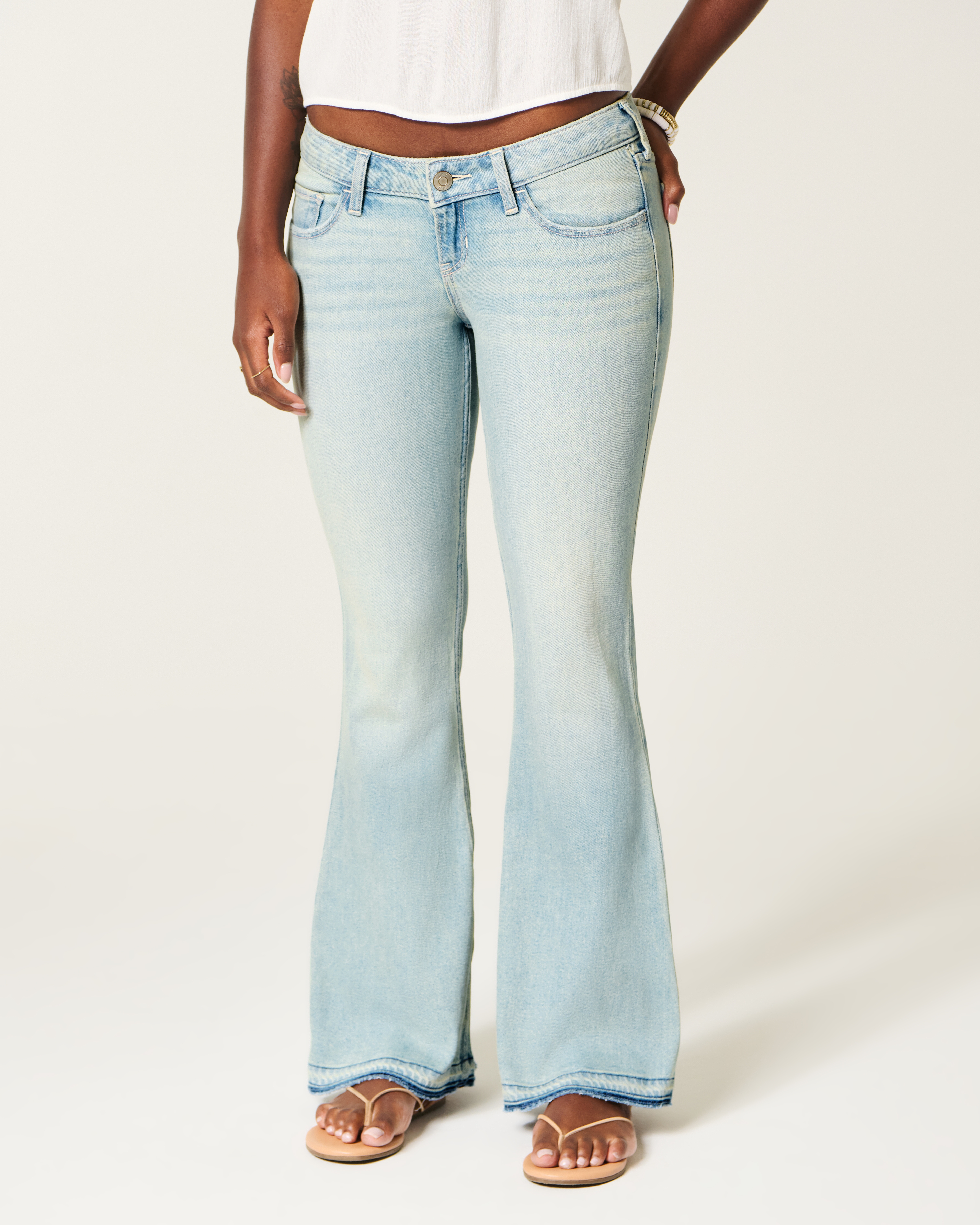 Ultra Low-Rise Light Wash Let-Down Hem Flare Jeans