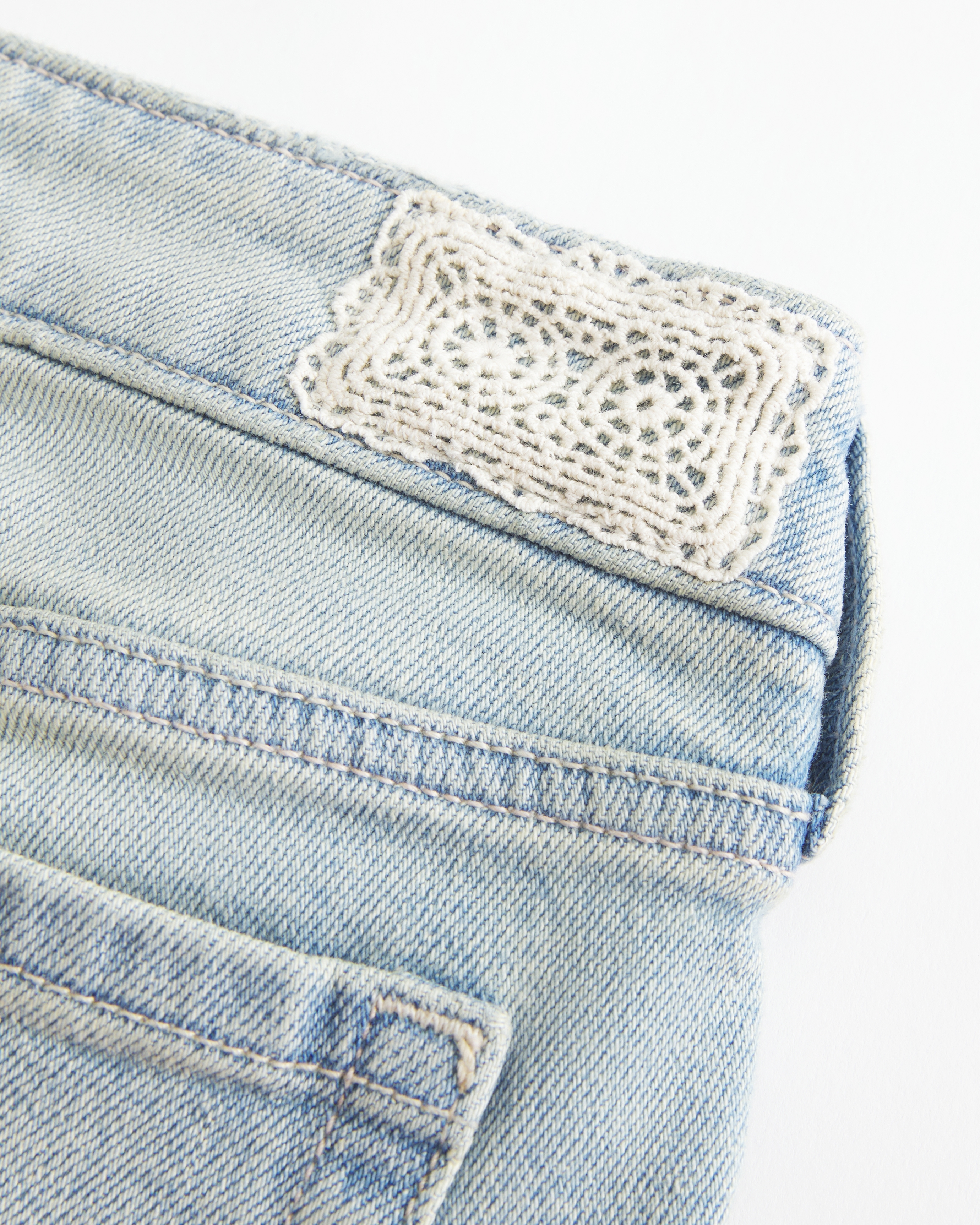 Ultra Low-Rise Light Wash Let-Down Hem Flare Jeans