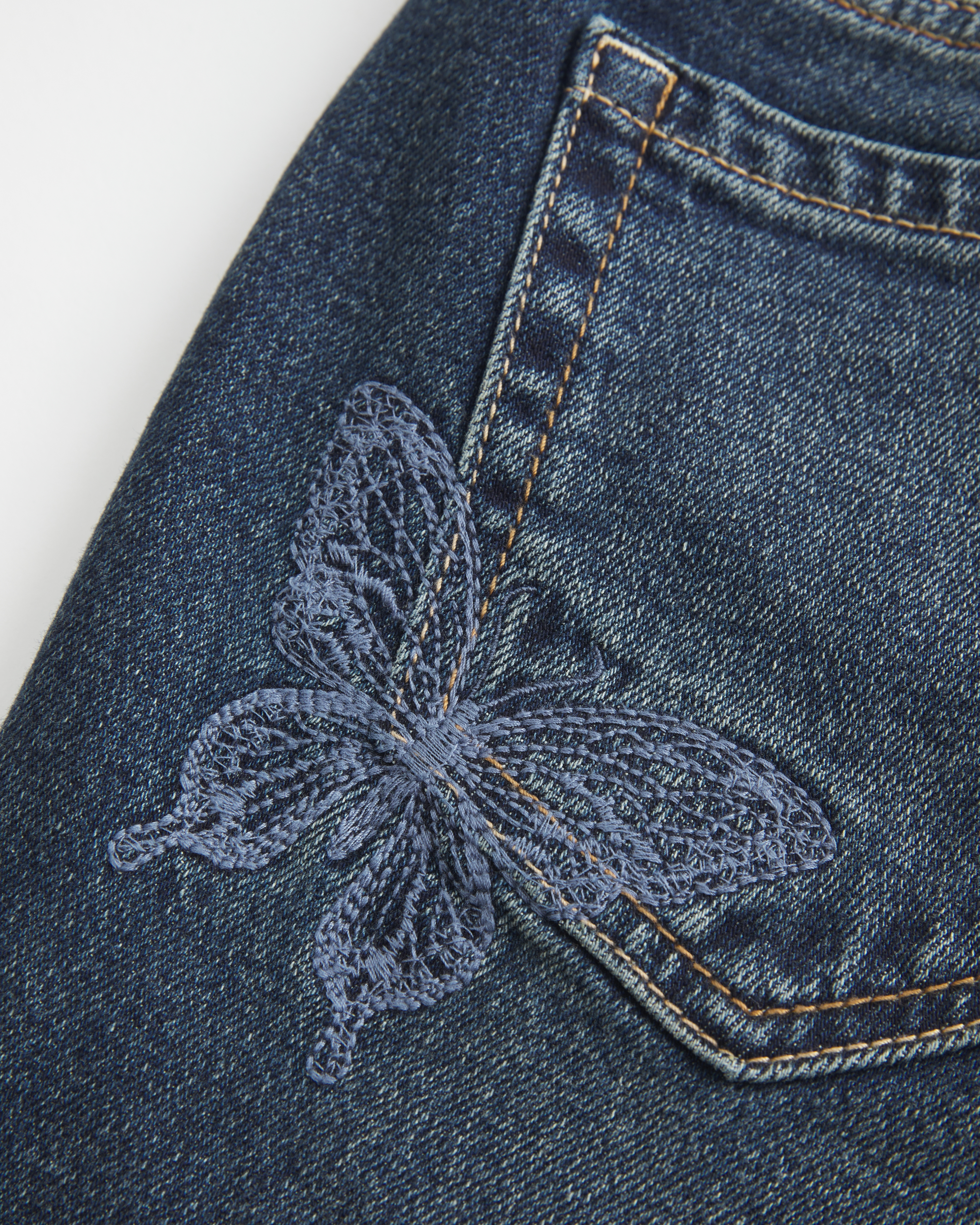 Ultra Low-Rise Dark Wash Butterfly Embroidery Flare Jeans