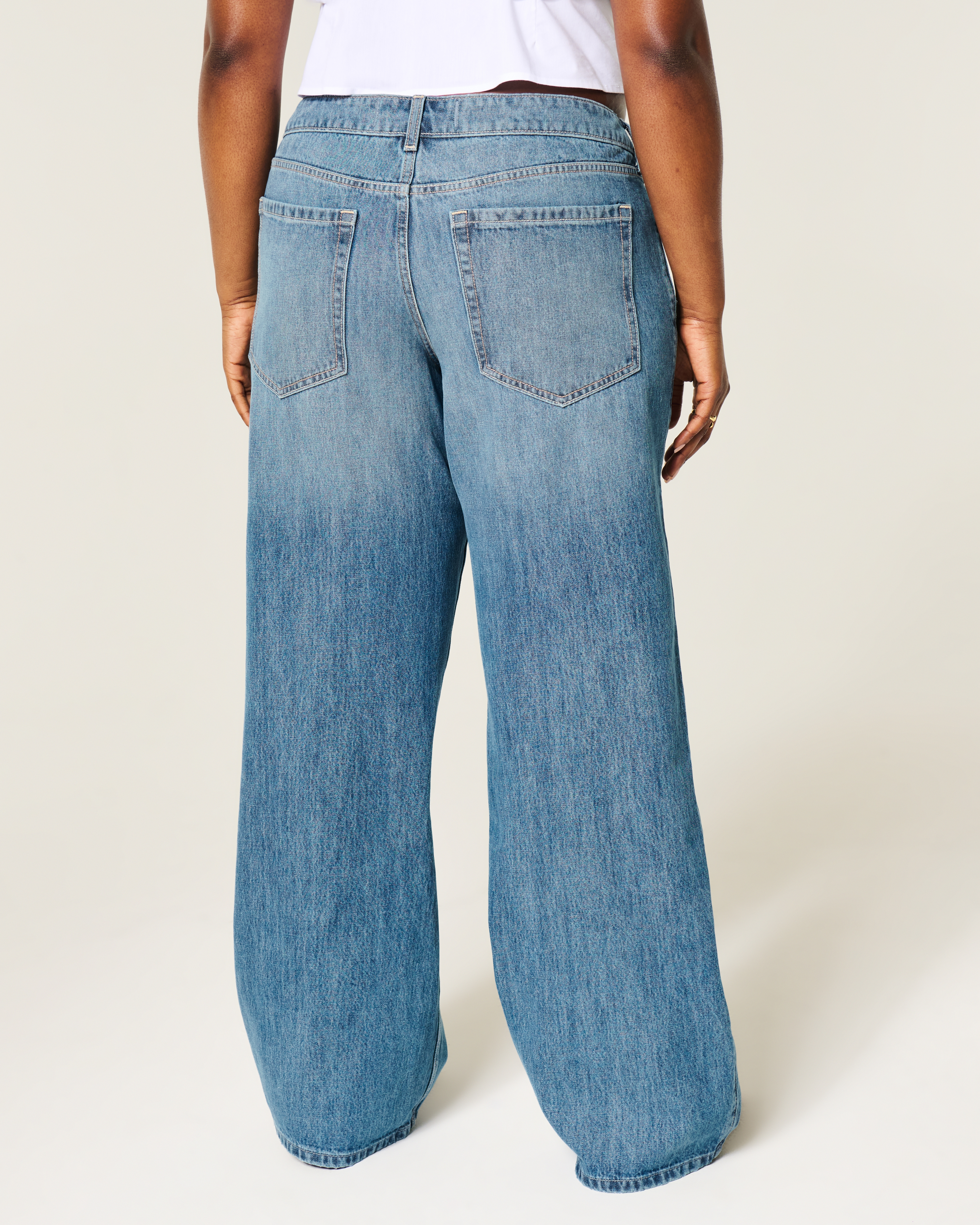 Ultra Low-Rise Medium Wash Baggy Jeans