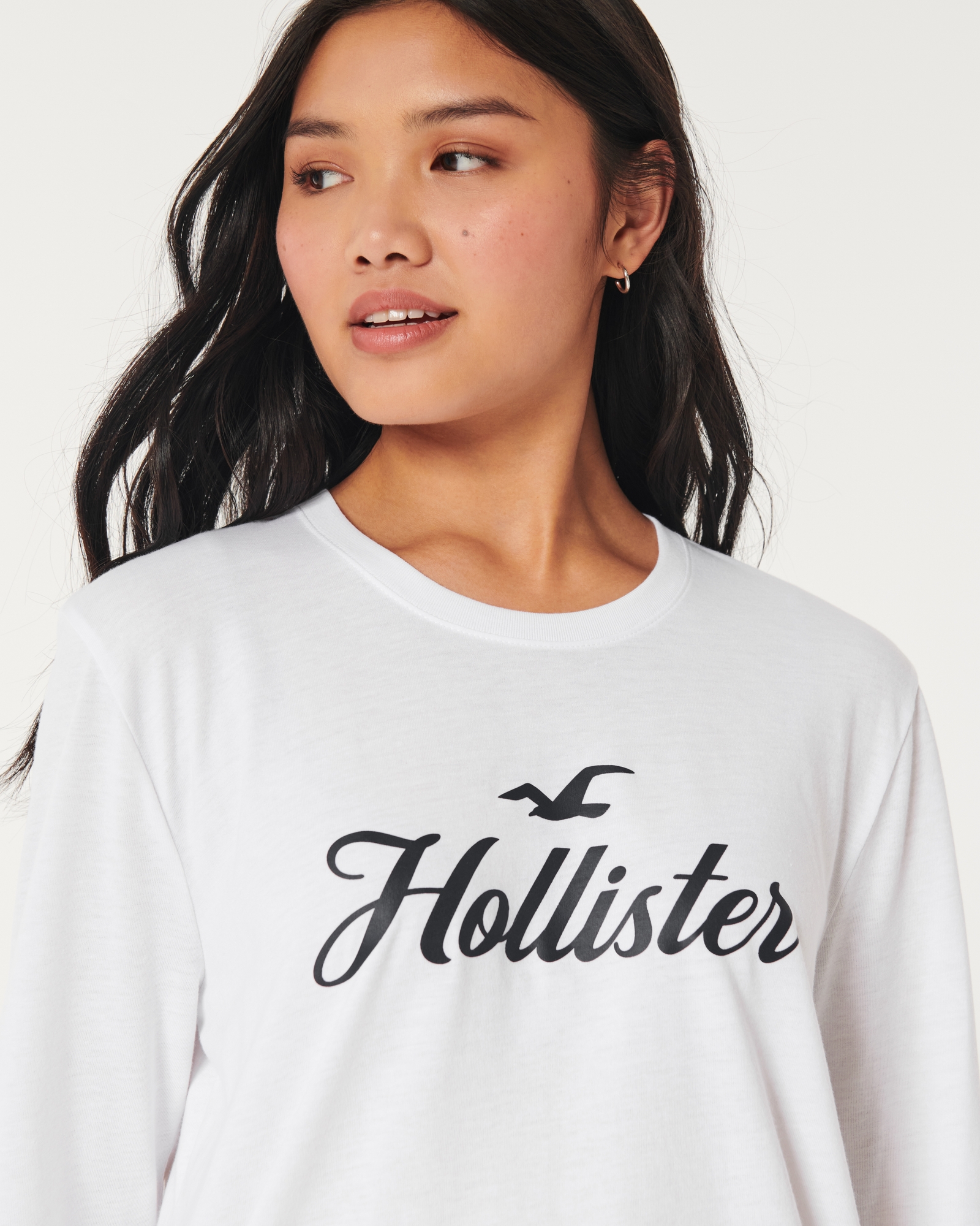 Hollister Women's Medium Black Long Sleeve T-Shirt with Flower Logo Graphic