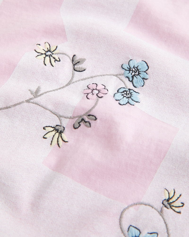 Oversized Off-the-Shoulder Varsity Floral Graphic Tee