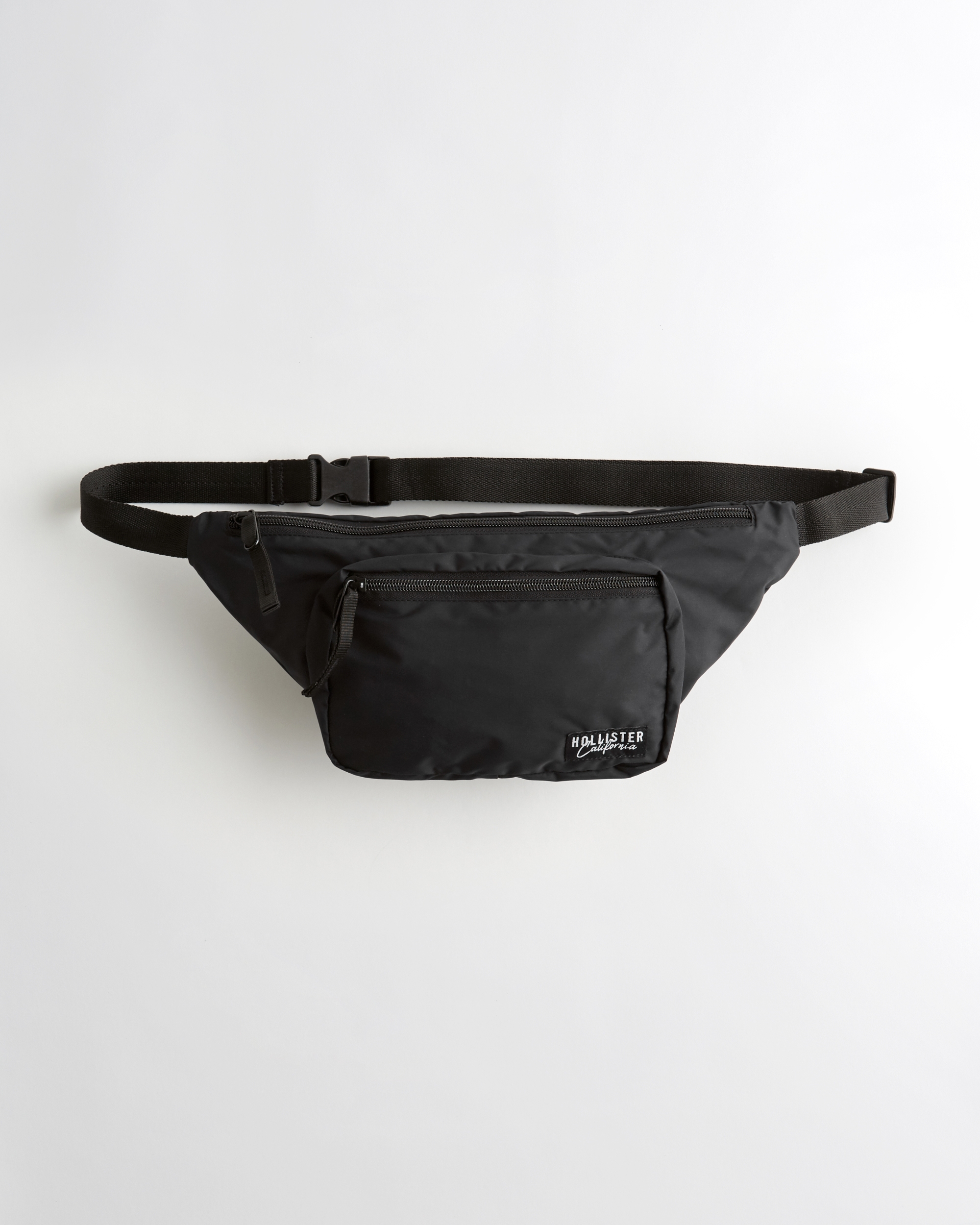 Belt bag featuring a front pocket with 