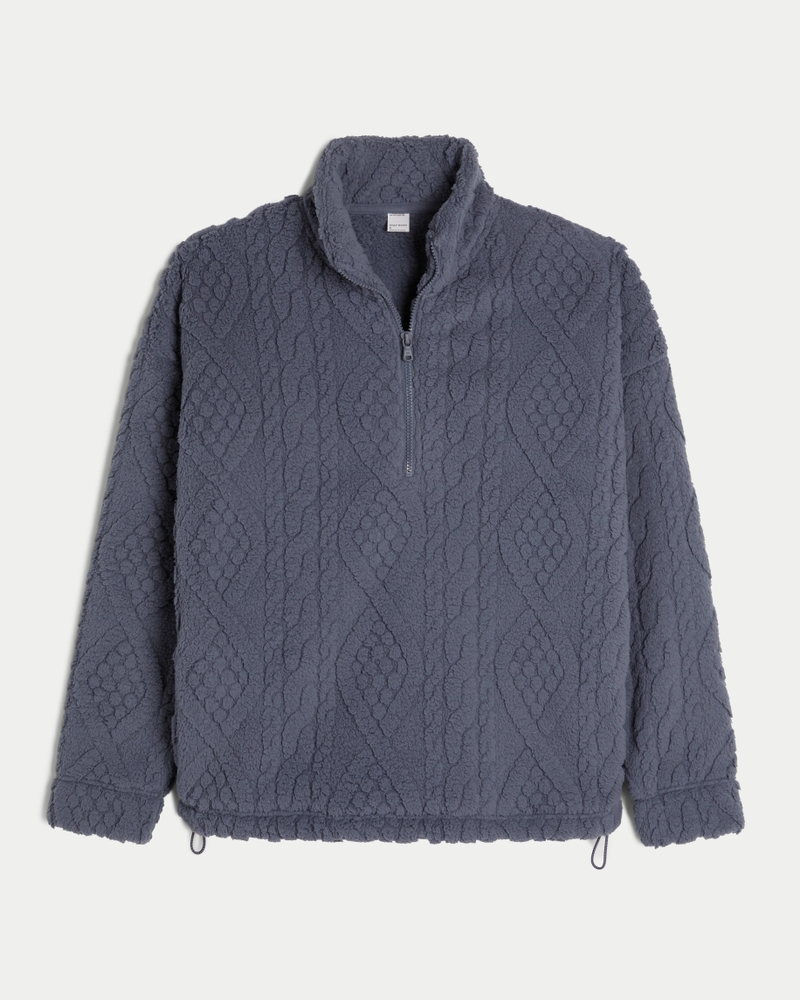 A grey blue quarter zip sweater